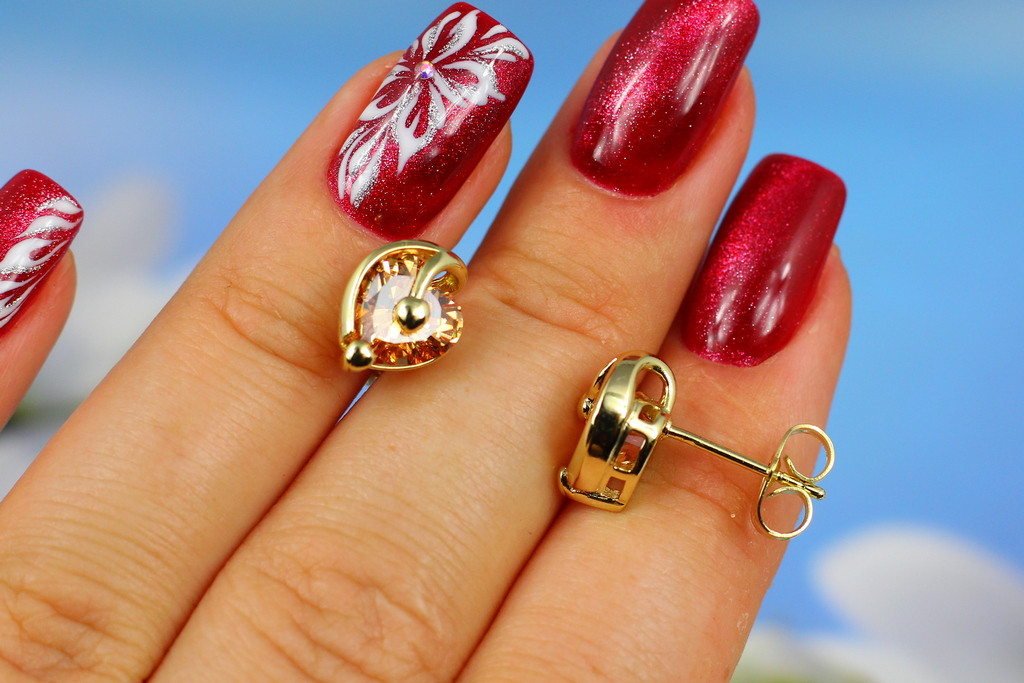 

Серьги гвоздики Xuping Jewelry ноты с камнем шампанское лимонные