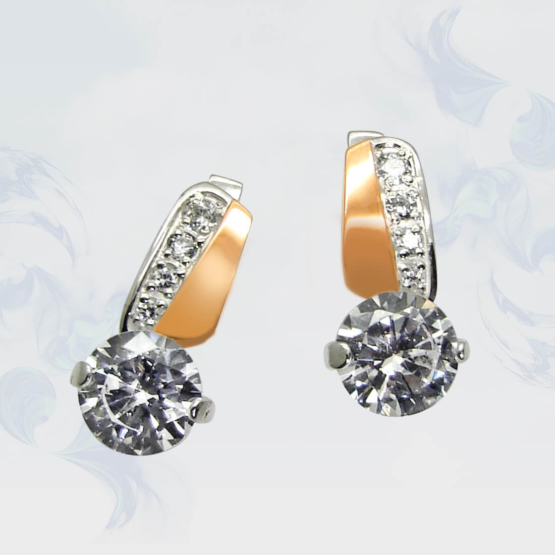 

Серьги из серебра с золотыми вставками SilverUA модель 046