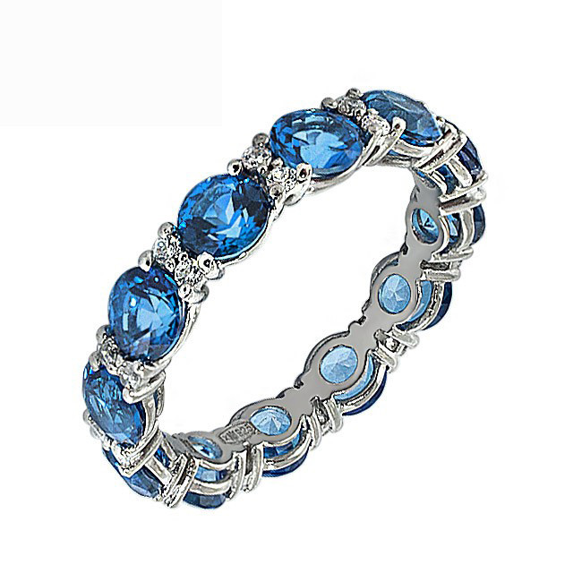 

Кольцо с синими топазами Swarovski Венчик счастье