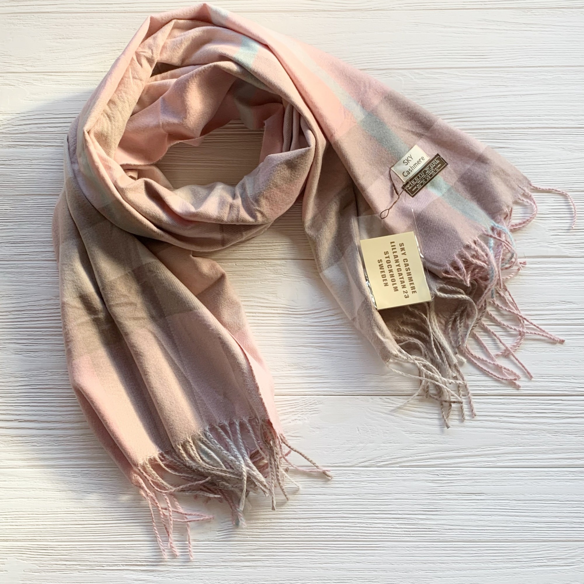 

Шерстяной шарф в клетку Sky Cashmere 200 см на 80 см пудровый 100393