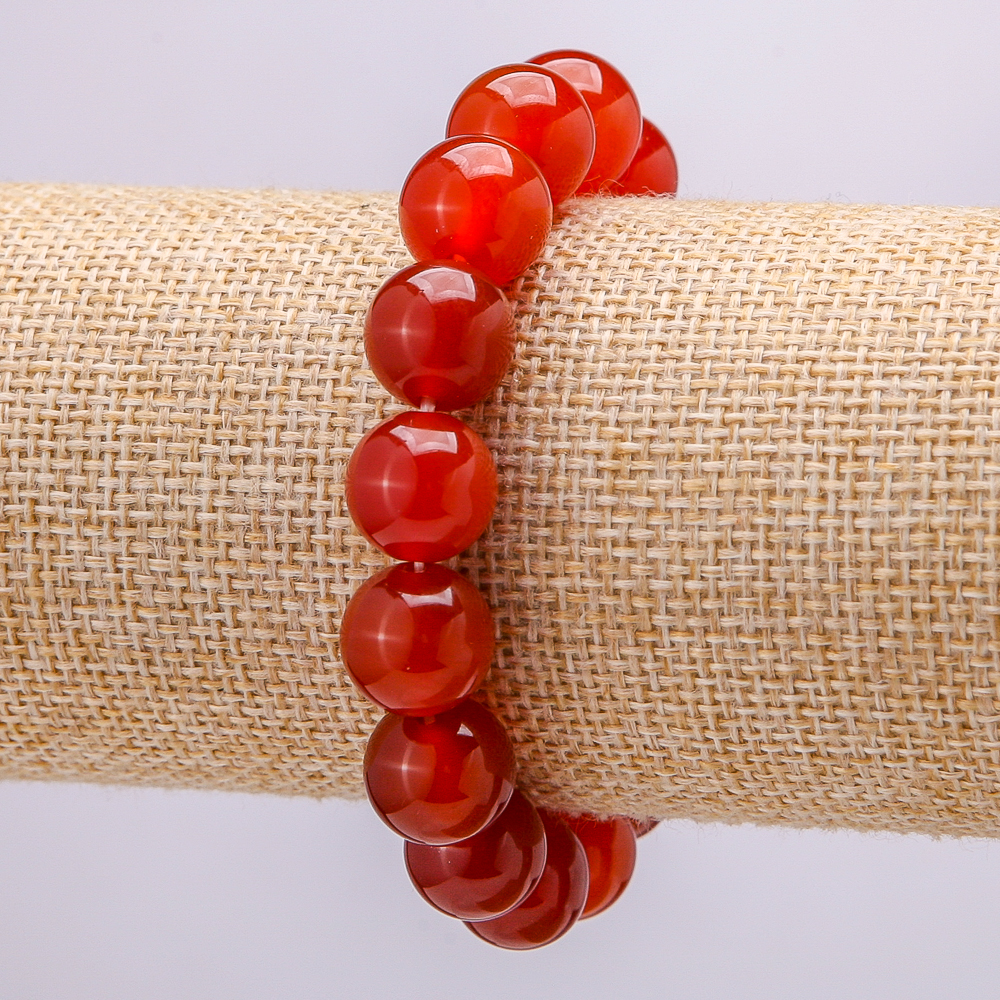 

Браслет на резинке из натурального камня Сердолик, обхват 18см, гладкий шарик, диаметр 12мм +-, ida41782