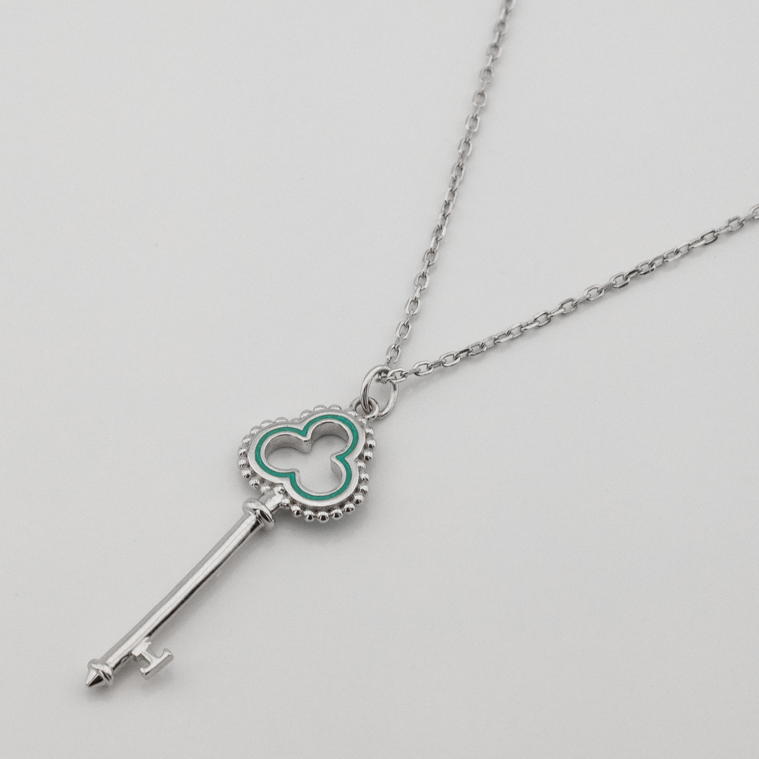 

Серебряное колье Ключик с бирюзовой эмалью ko14500 Диамант, 45 размер