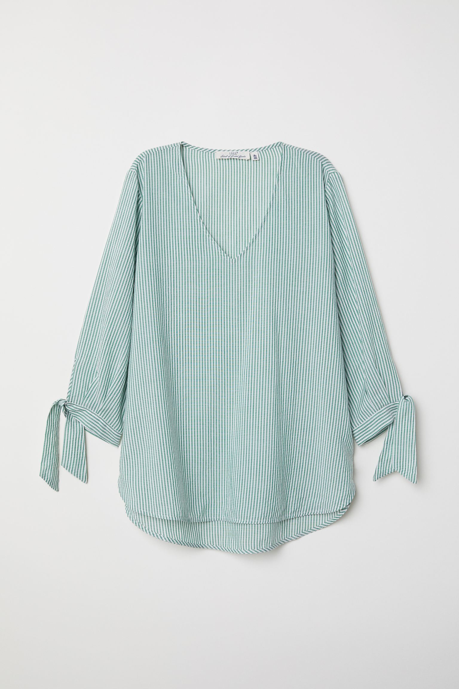 

Блуза H&M 40 бело-зеленая полоска 6316328RP21_бело-зеленая полоска