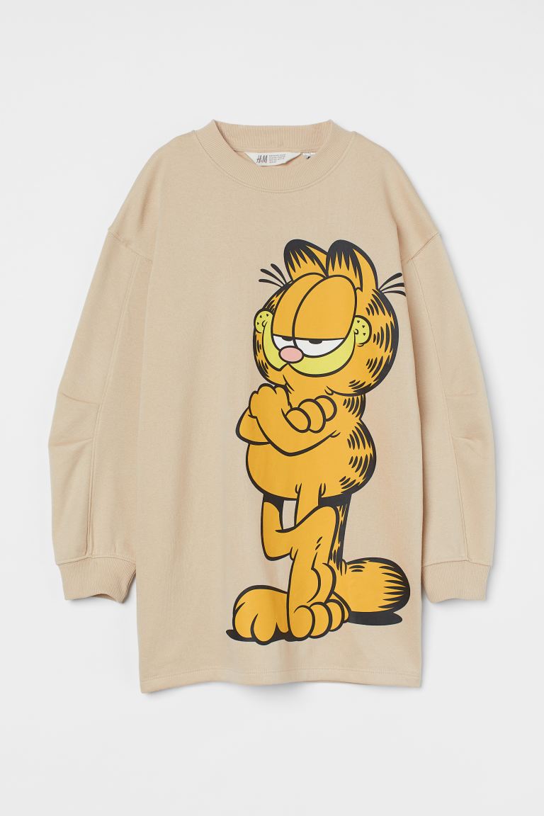 

Світшот Oversized з принтом H&M HM10299 134-140 см Бежевий (P-6910806231178)