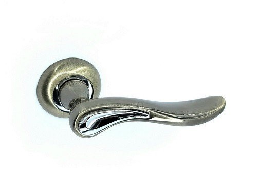 

​Ручка дверная межкомнатная TRION ЦАМ NAVARA 17 AB/CP