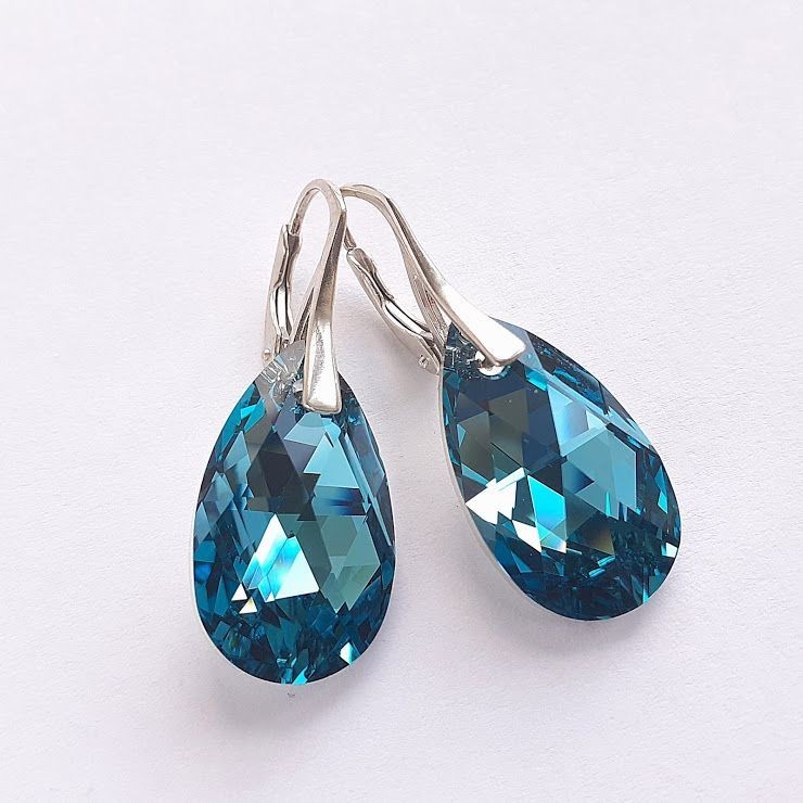 

Сережки из серебра с подвесками Сваровски
