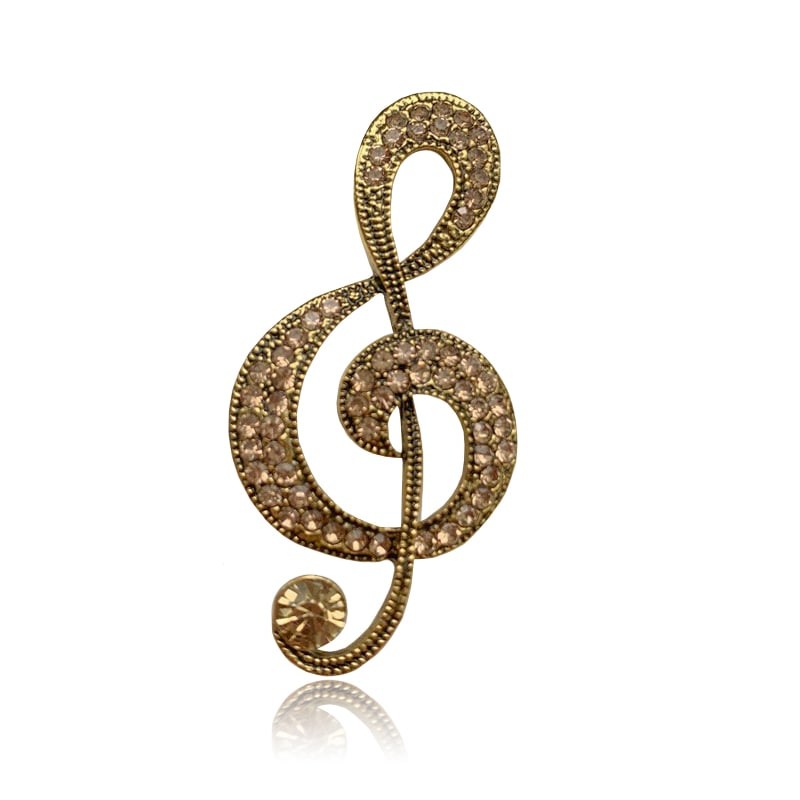 

Брошь унисекс BROCHE бижутерия с кристаллами Музыка Скрипичный ключ золотистая BRBF112244