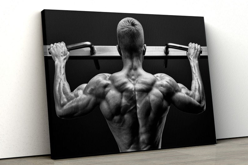 

Картина на холсте Мускулистый спортсмен51x34 см (86)