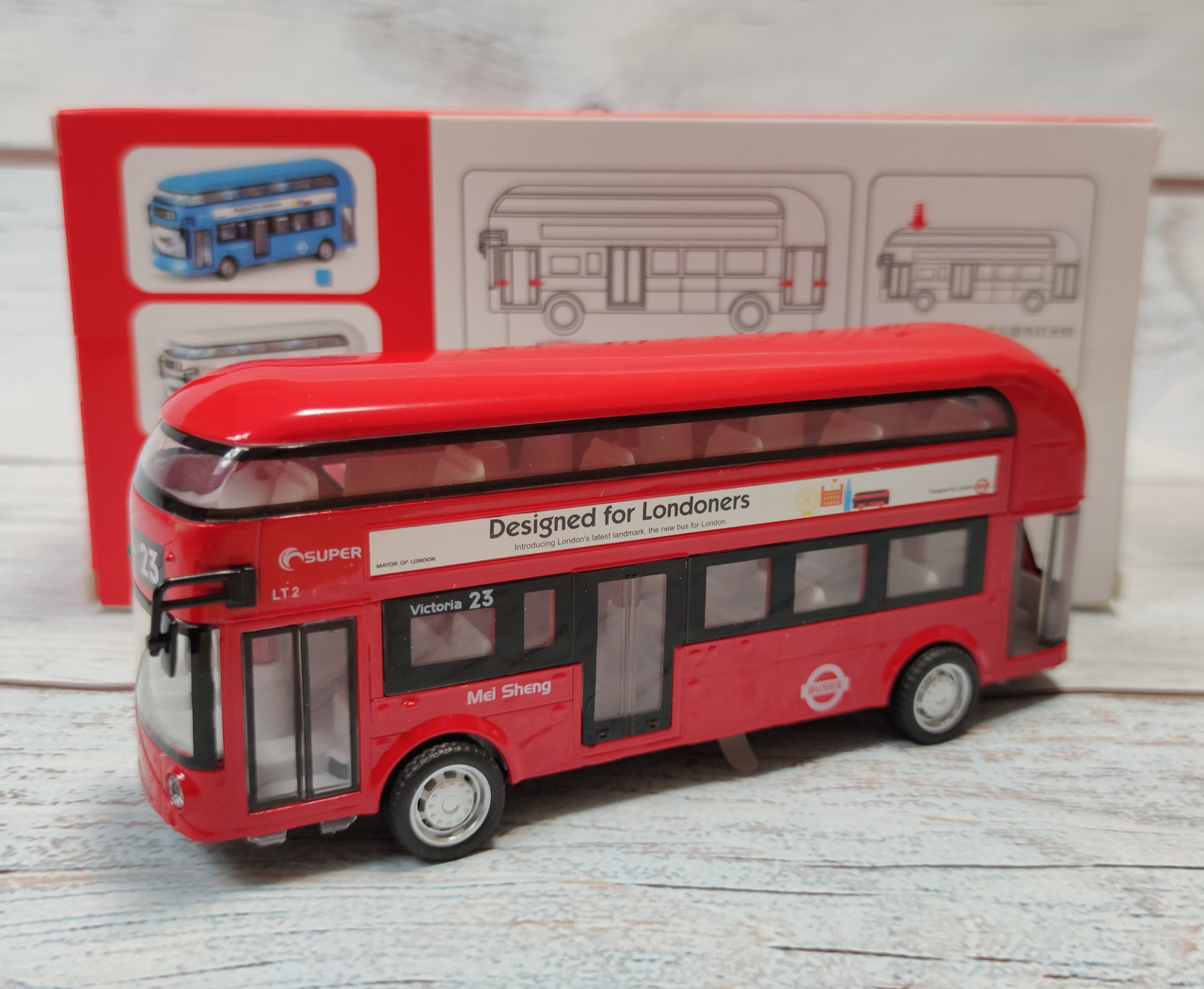 

Детский игрушечный автобус метал игрушка двух этажный открывается дверь звук и свет красный 22см