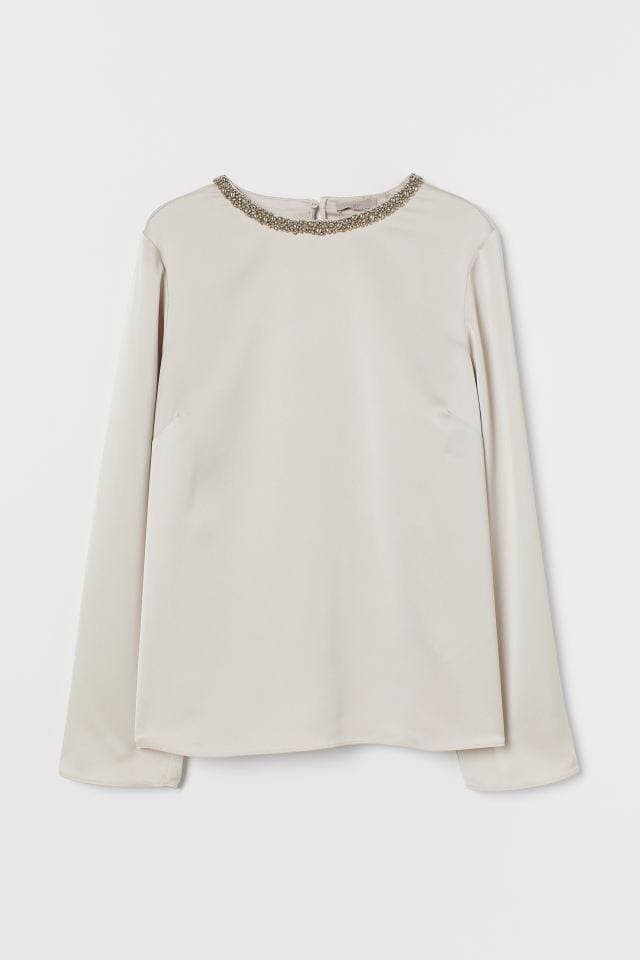 

Блуза женская H&M 2D54F M бежевая 0562