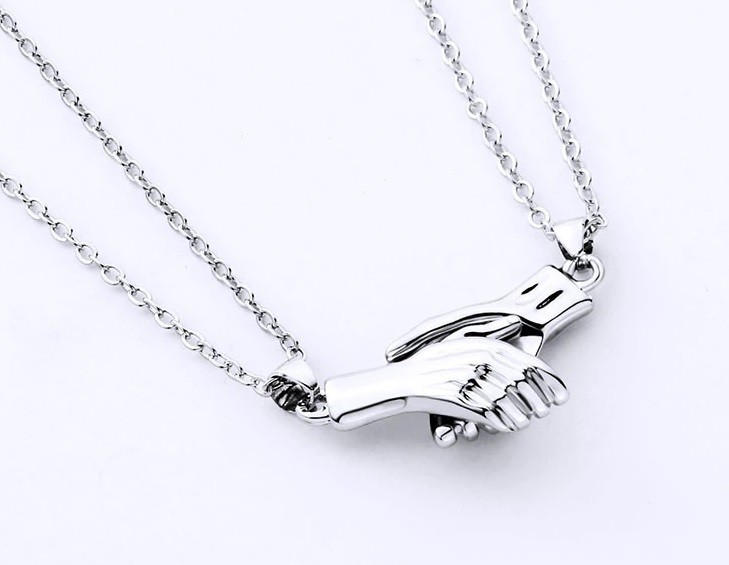

Магнитные кулоны для пары Рука в руке Silver