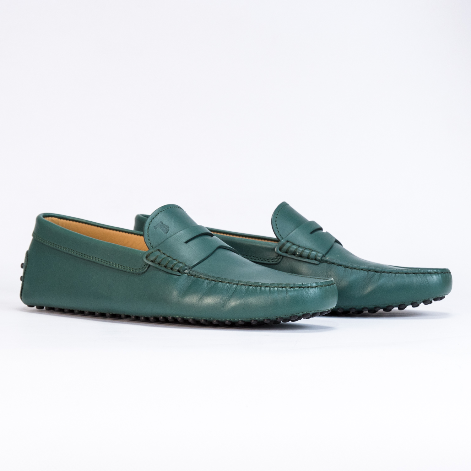 

Мокасины Tod's Mocassino New Gommini 122 Uomo BR0 Bottiglia 40,5