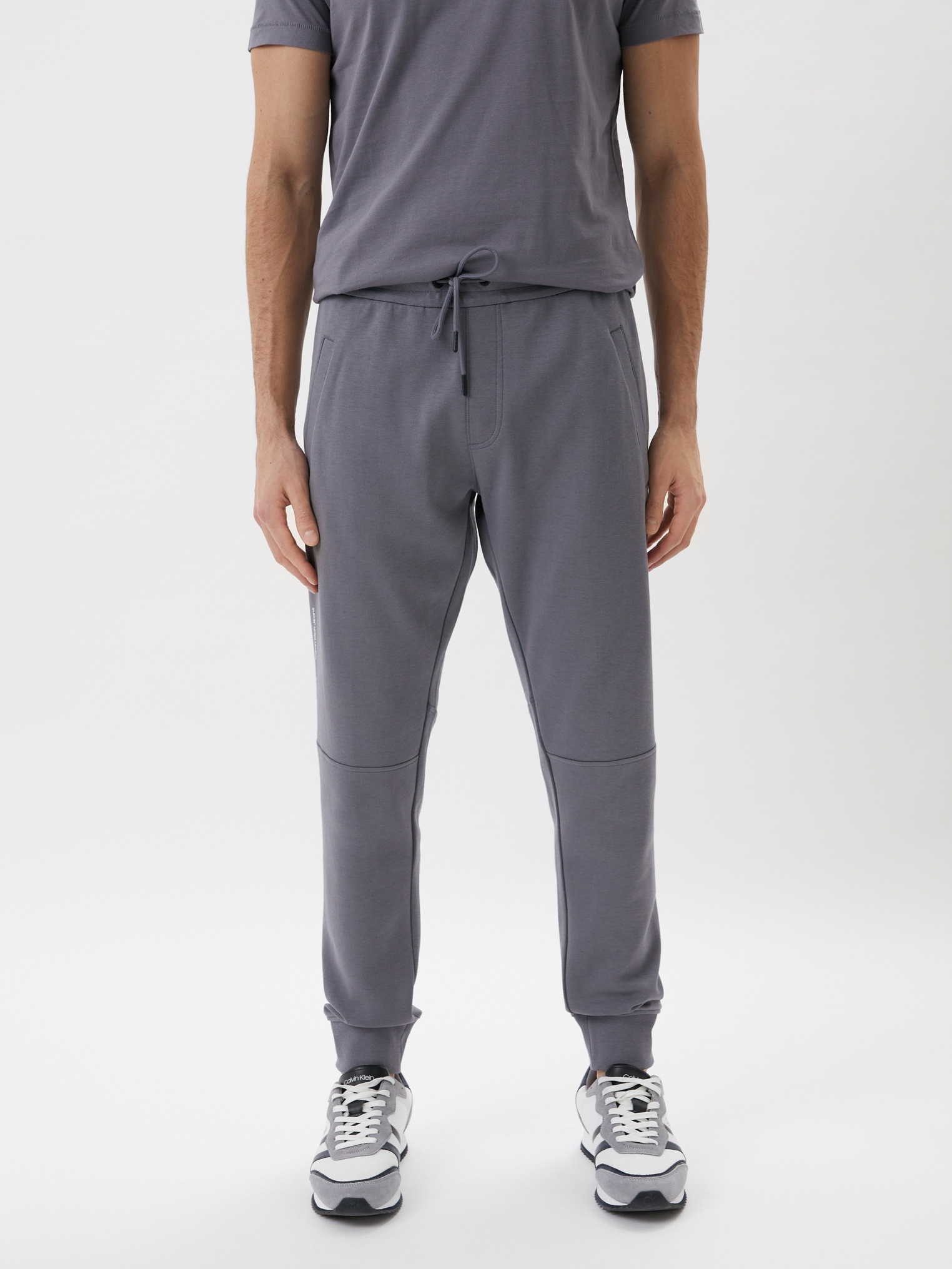 

Спортивные штаны Calvin Klein Jeans Repeat Logo Pant J30J319652-PTP  Fossil Grey, Спортивные штаны Calvin Klein Jeans Repeat Logo Pant J30J319652-PTP L Fossil Grey