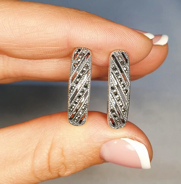 

Сережки серебряные с марказитом 5,83 г