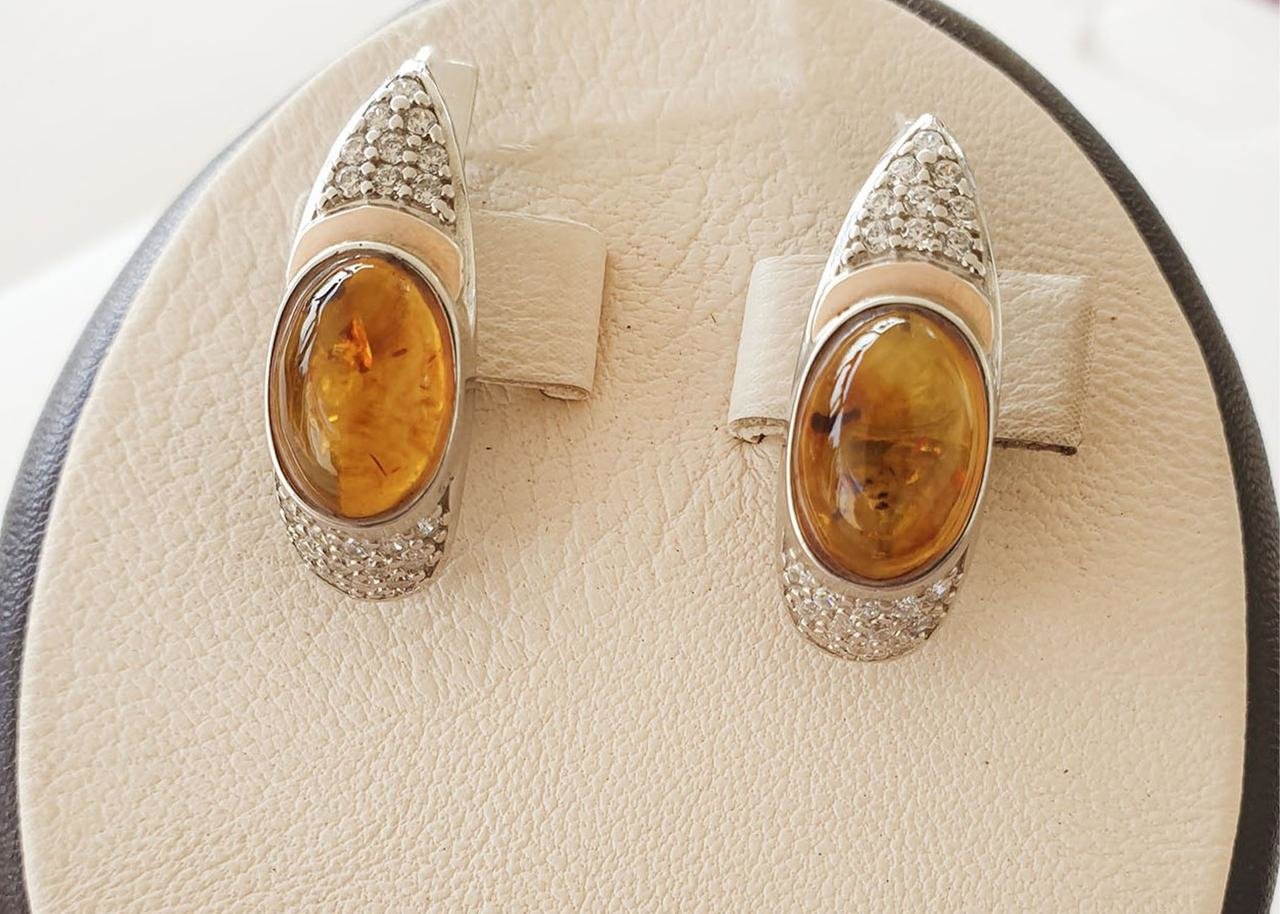 

Сережки серебряные с янтарем 6,68 г