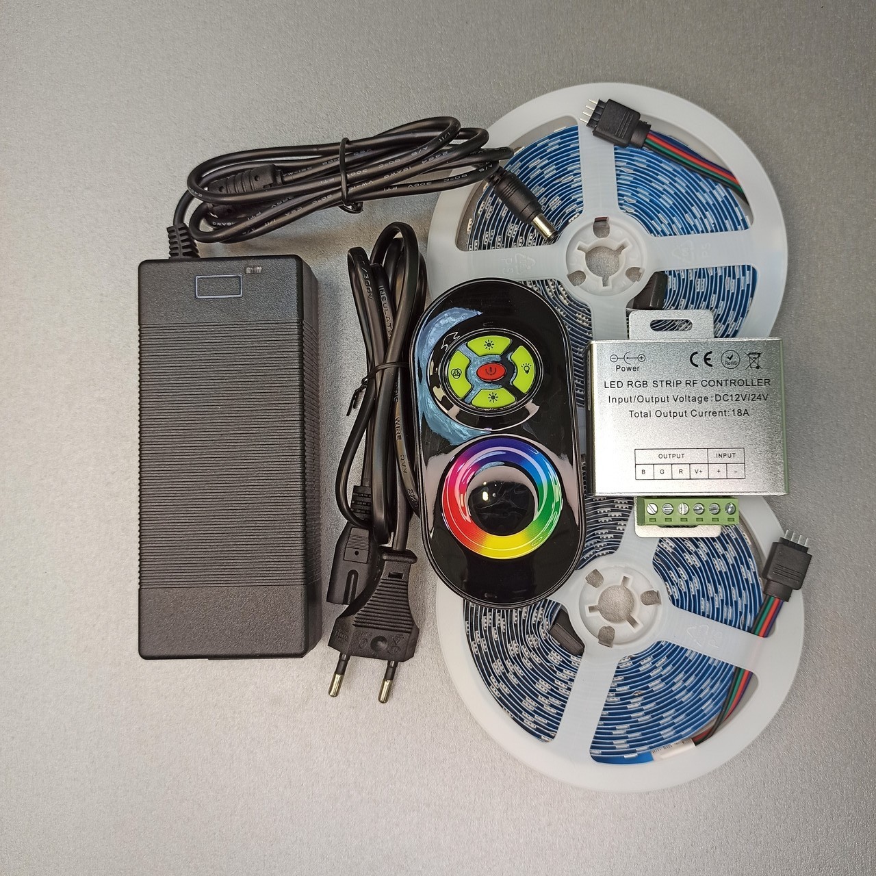 

Комплект лента светодиодная AVT RGB 24V 10 метров с регулировкой цвета радиоканал IP20 без силикона