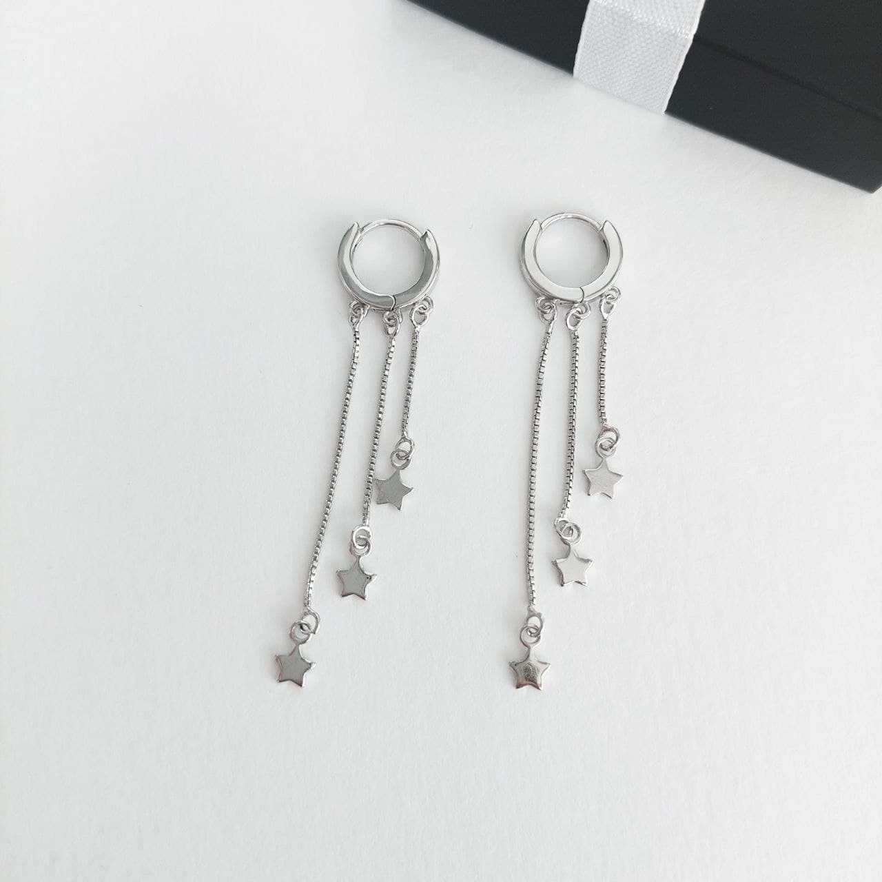 

Серьги кольца с цепочками и звездами серебряные MK1137