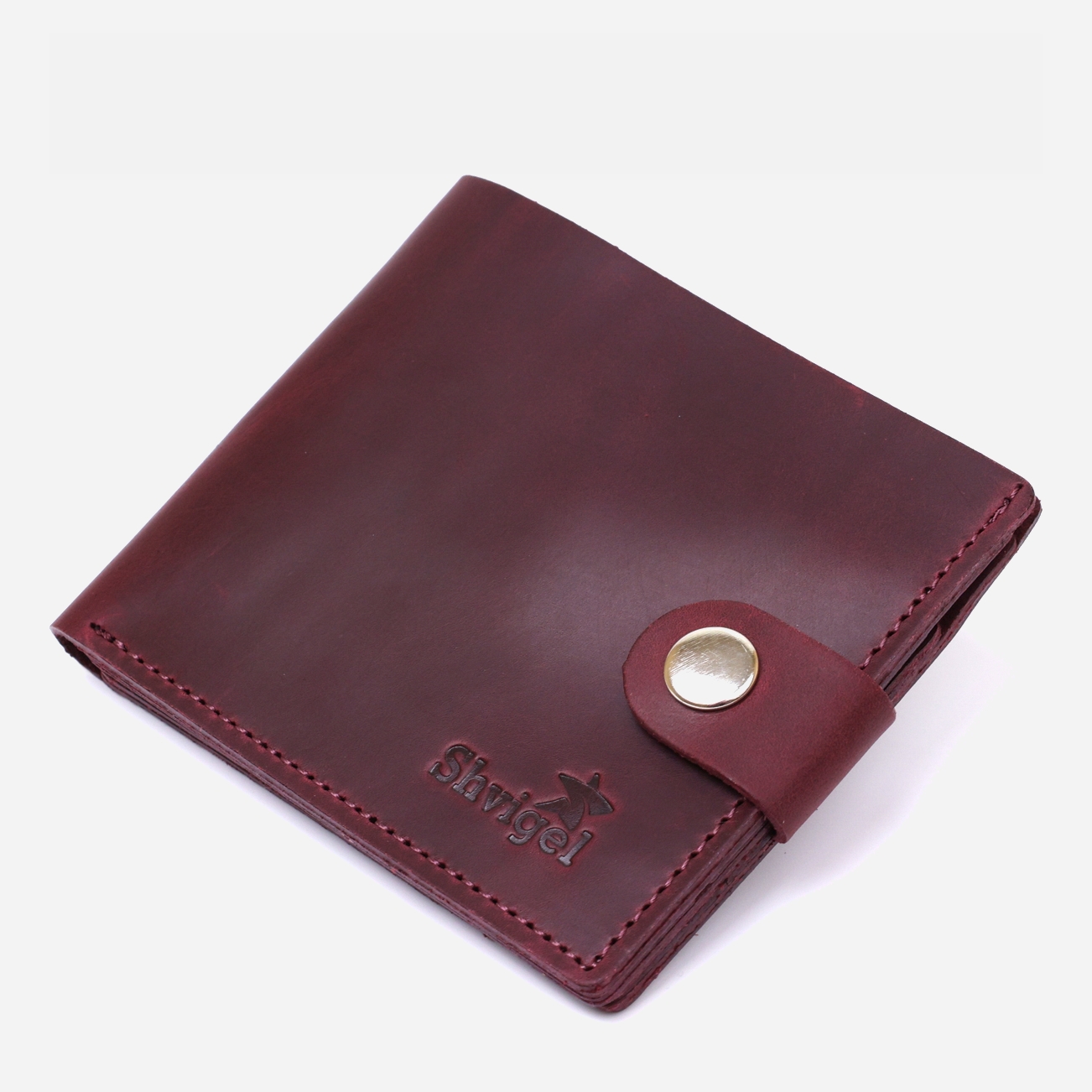 

Женский кошелек кожаный Shvigel leather-16436 Бордовый
