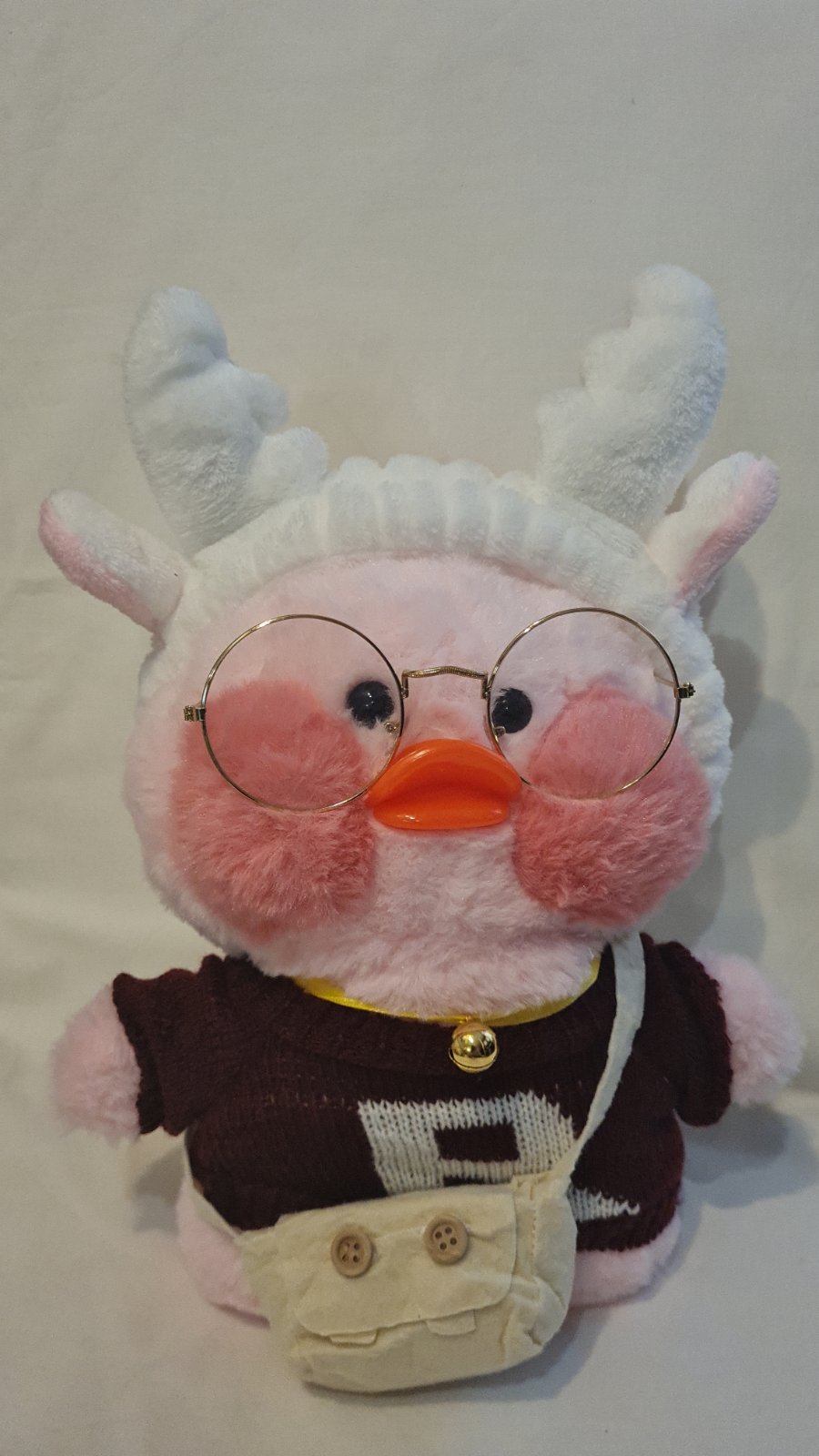 

Мягкая игрушка Плюшевая Лалафанфан Уточка Lalafanfan Duck в одежде 33 см розовый белые ушки