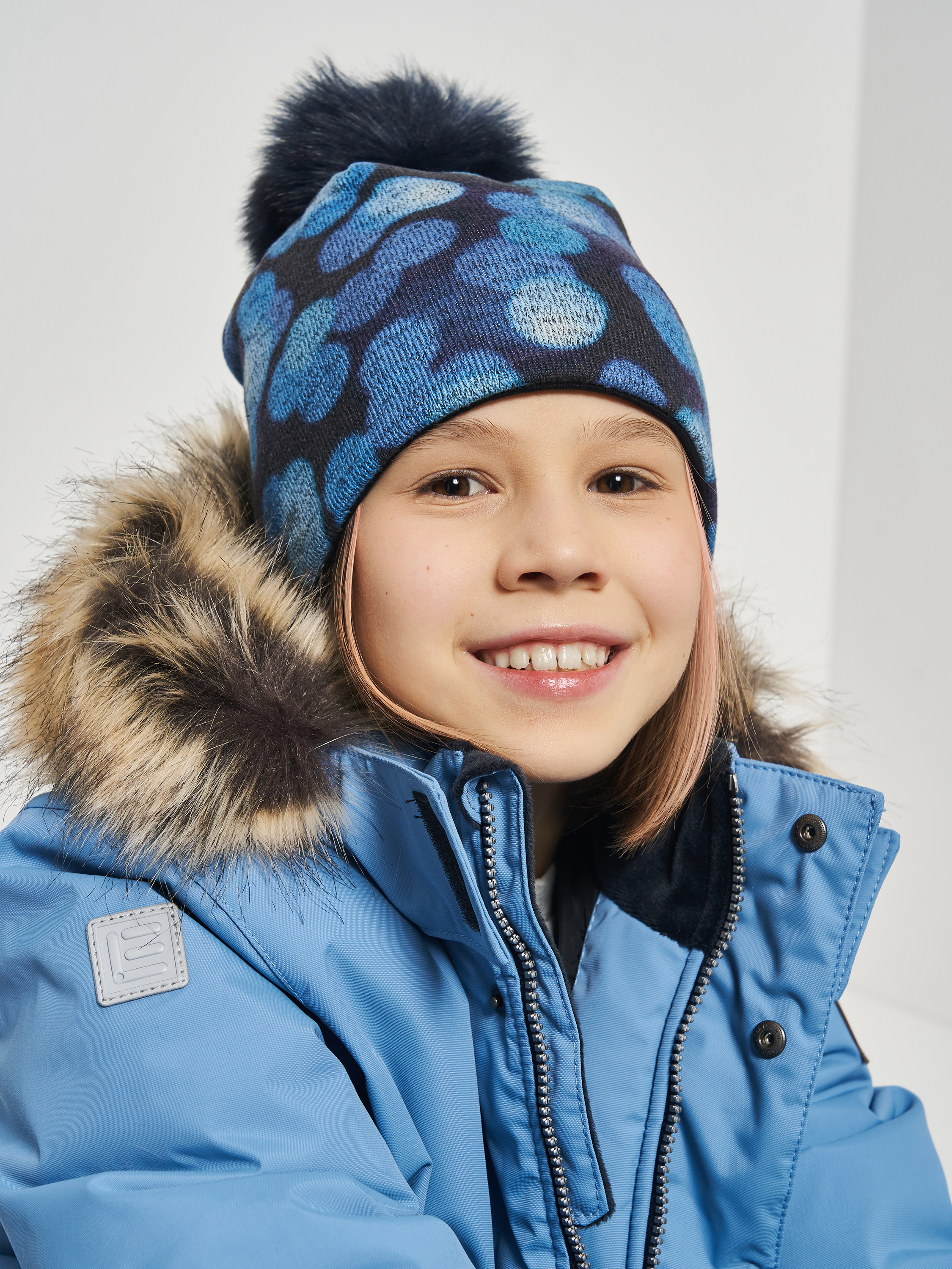 Акція на Дитяча зимова шапка-біні в'язана з помпоном для дівчинки Broel Nikita ZB13643S9BRO-015 55 см Гранатова від Rozetka