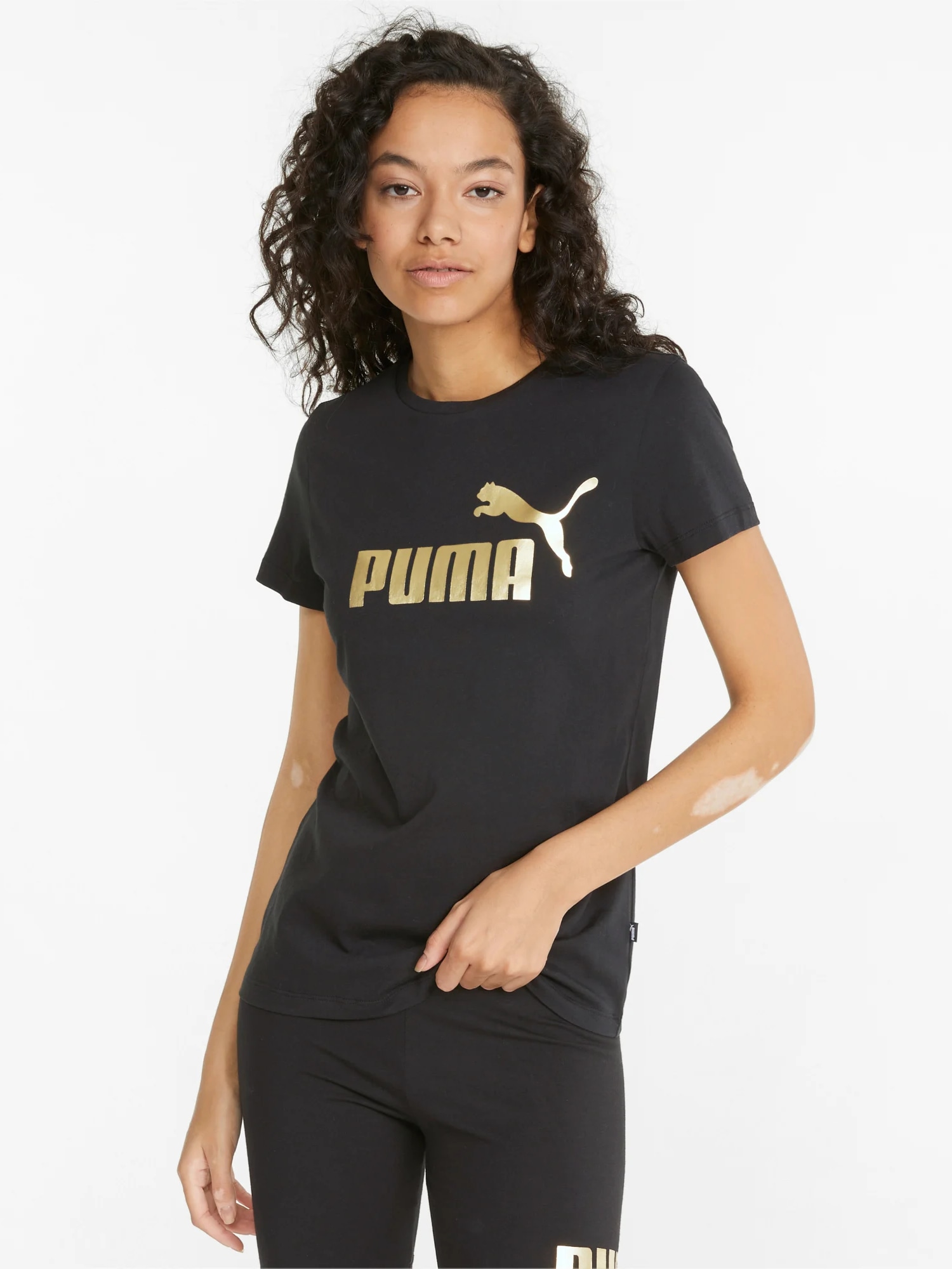 Акція на Футболка Puma Ess+ Metallic Logo Tee 84830301 XL Puma Black-Gold Foil від Rozetka