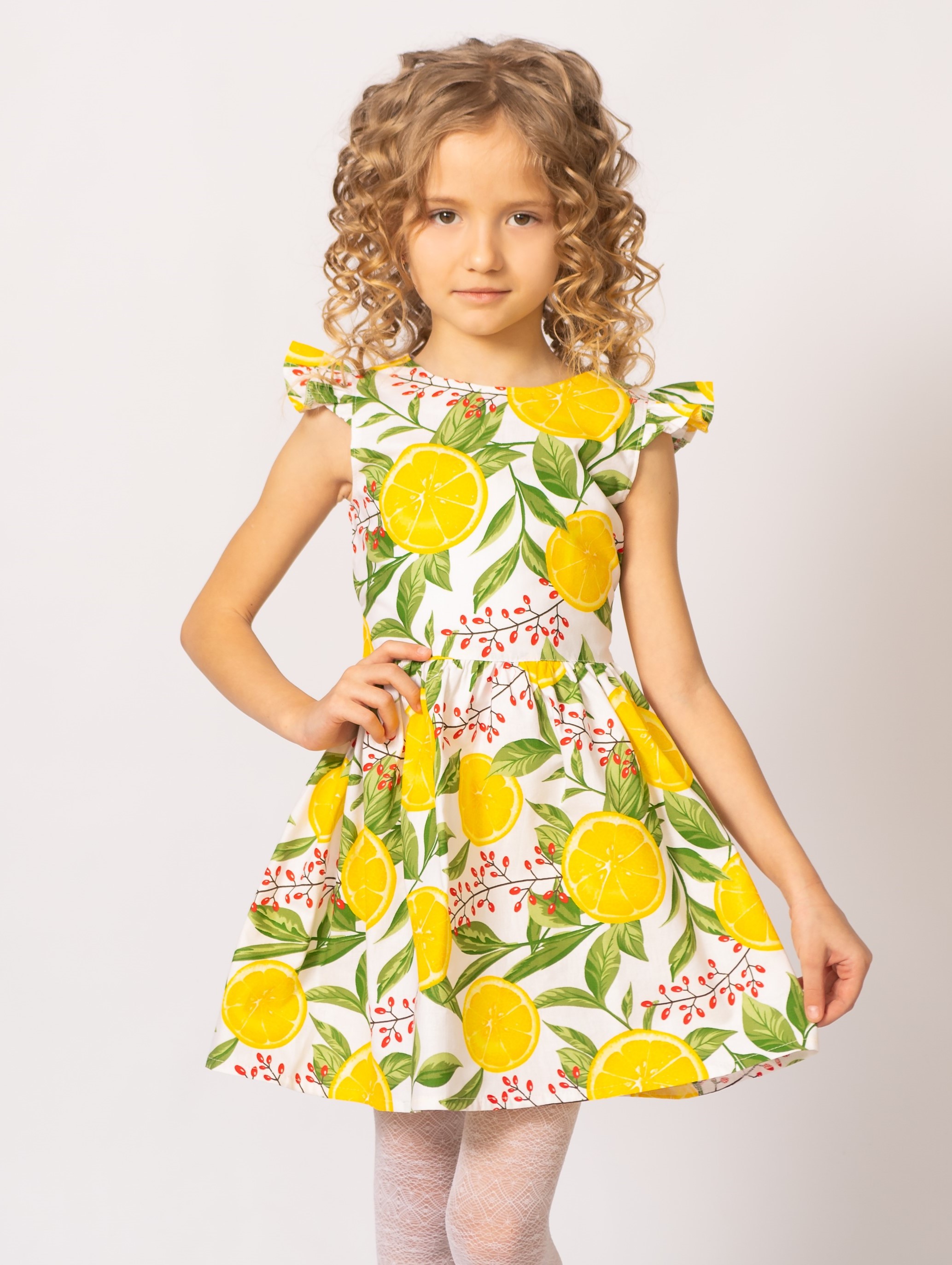 Акція на Дитяче літнє плаття для дівчинки Ластівка 20_5040 134 см Біле/Лимони від Rozetka