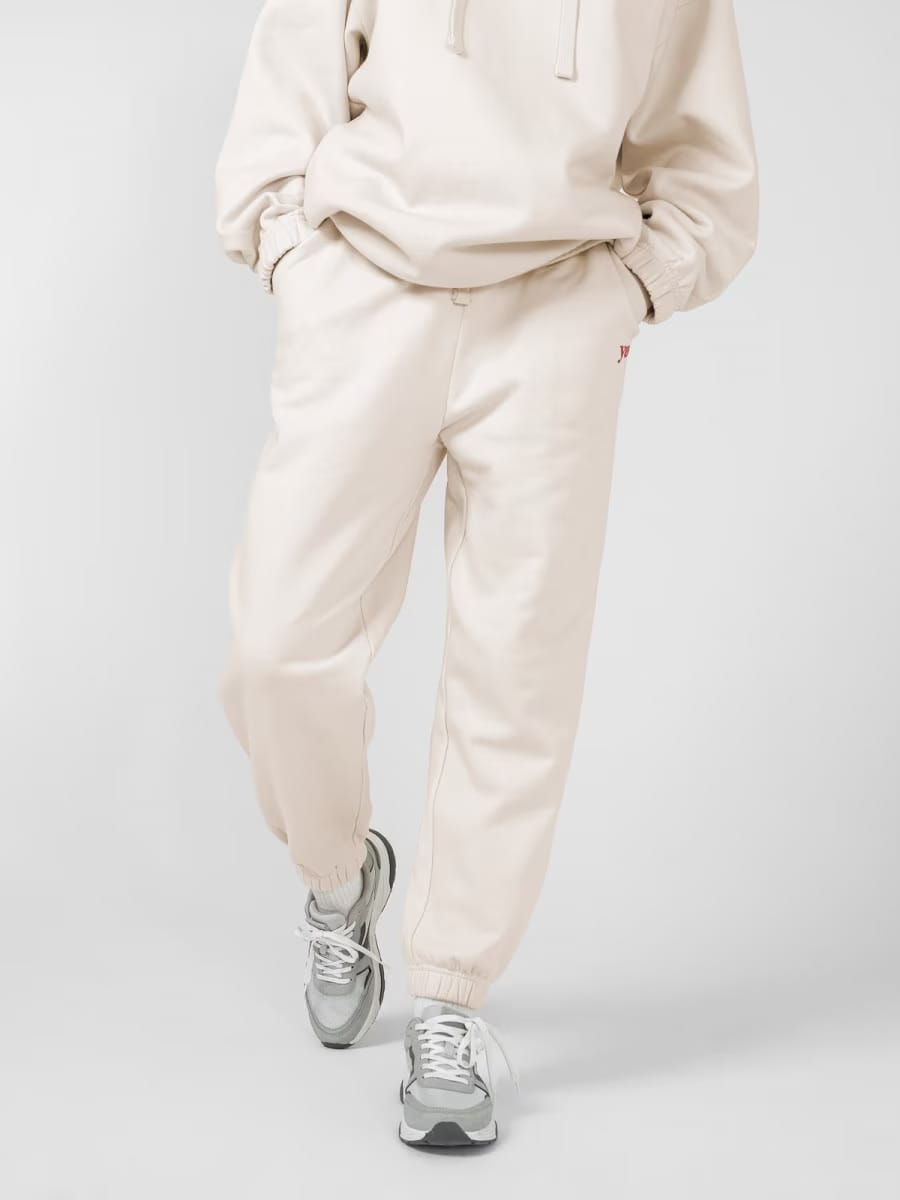 Акція на Спортивні штани жіночі Outhorn Trousers Cas F178 OTHSS23TTROF178-11S S Бежеві від Rozetka