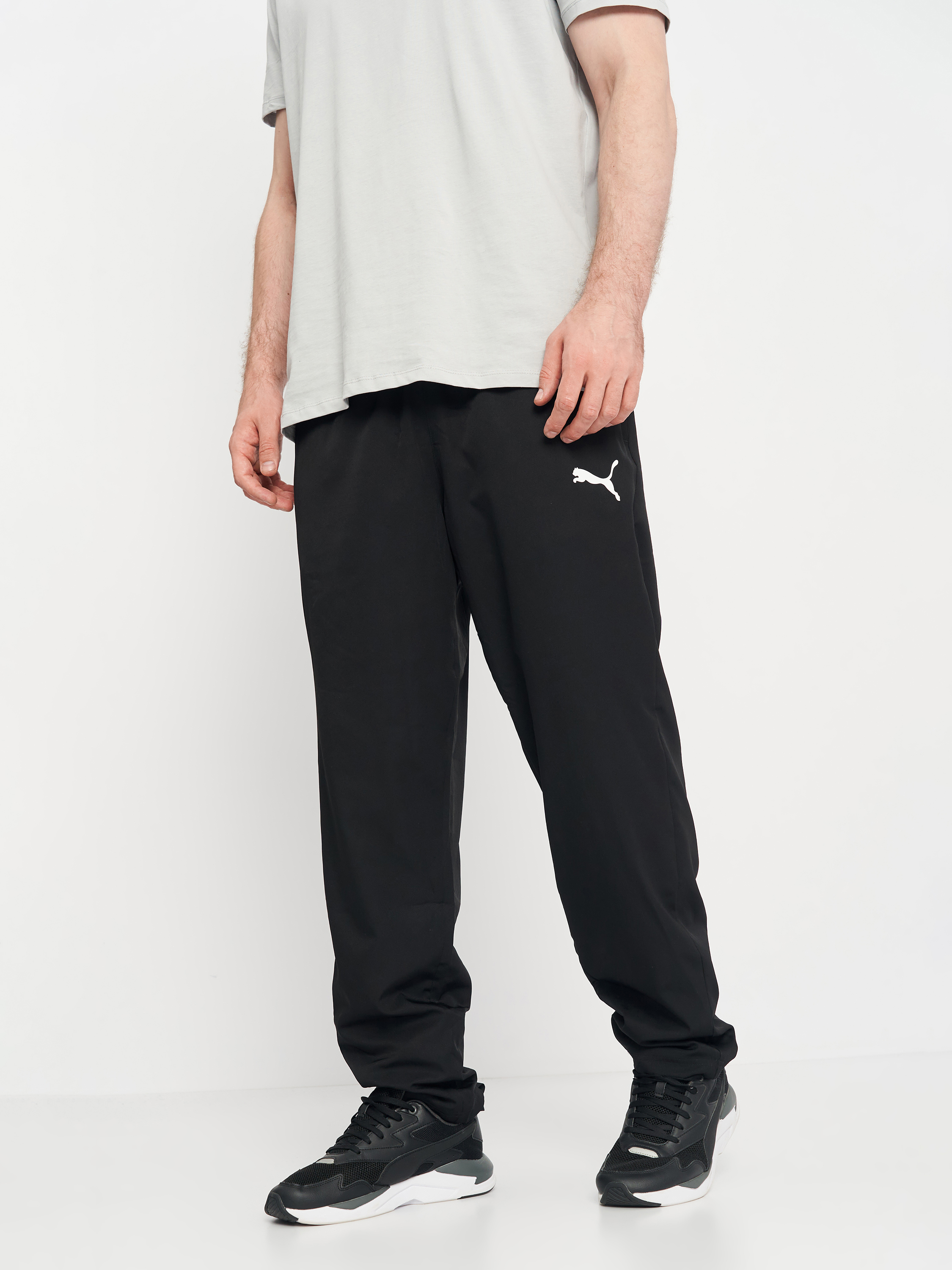 Акція на Спортивні штани чоловічі Puma DRYCELL Active Woven Pants 58673201 M Black від Rozetka