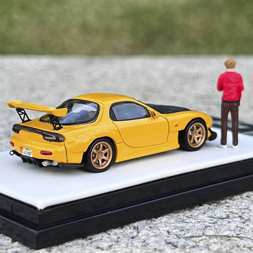 Модель машины Mazda RX 7 Форсаж 1:64 металлическая с подставкой Желтый  (1012-606-04) – фото, отзывы, характеристики в интернет-магазине ROZETKA от  продавца: Market-sell | Купить в Украине: Киеве, Харькове, Днепре, Одессе,  Запорожье, Львове