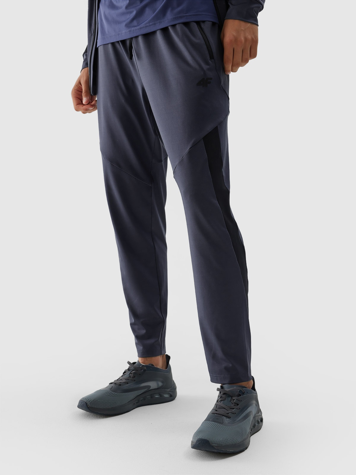 Акція на Спортивні штани чоловічі 4F Trousers Fnk M351 4FAW23TFTRM351-23S XL Сірі від Rozetka