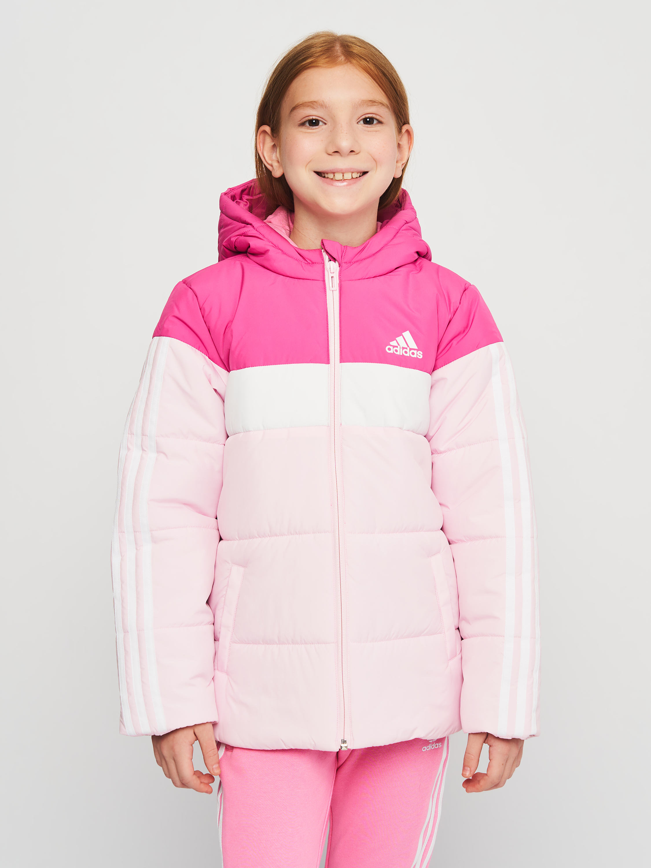 Акція на Дитяча куртка демісезонна для дівчинки Adidas Essentials Jk Pad Jkt IL6085 122 см Preloved Fuchsia від Rozetka