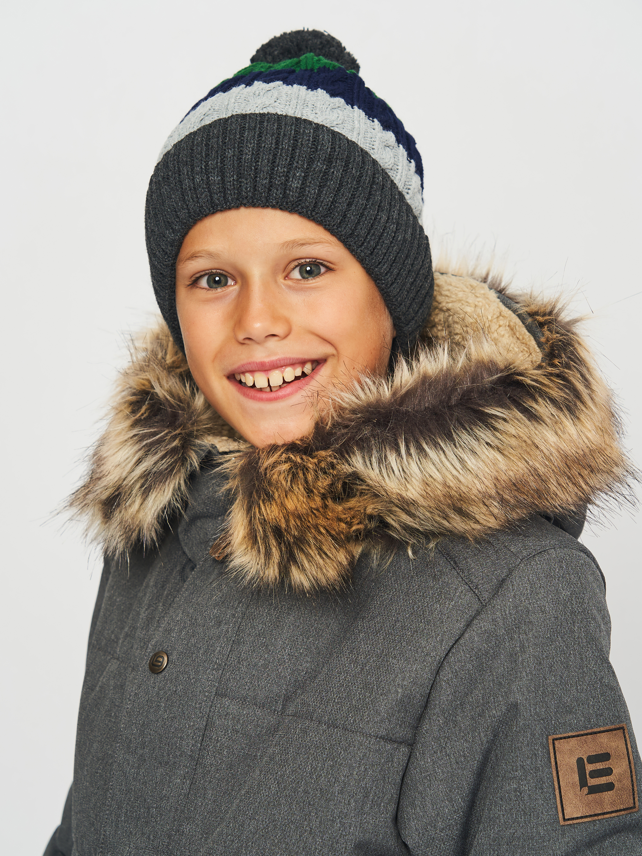 Акція на Дитяча зимова шапка-біні в'язана з помпоном для хлопчика Coccodrillo Accessories Winter Boy ZC2364311AWB-022 50 см Різнокольорова від Rozetka