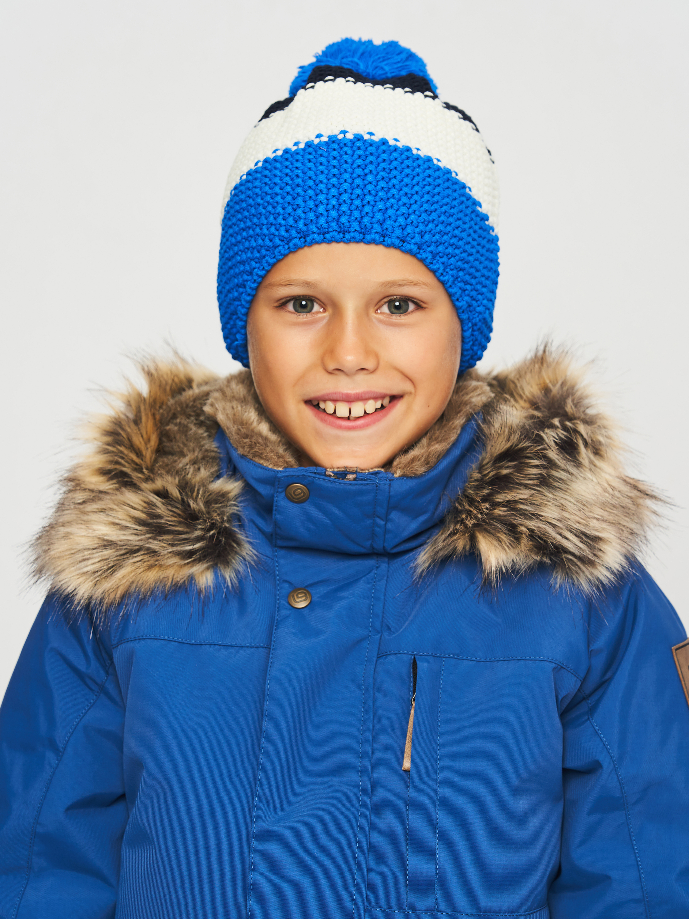 Акция на Дитяча зимова шапка-біні в'язана з помпоном для хлопчика Coccodrillo Accessories Winter Boy ZC2364316AWB-022 50 см Різнокольорова от Rozetka