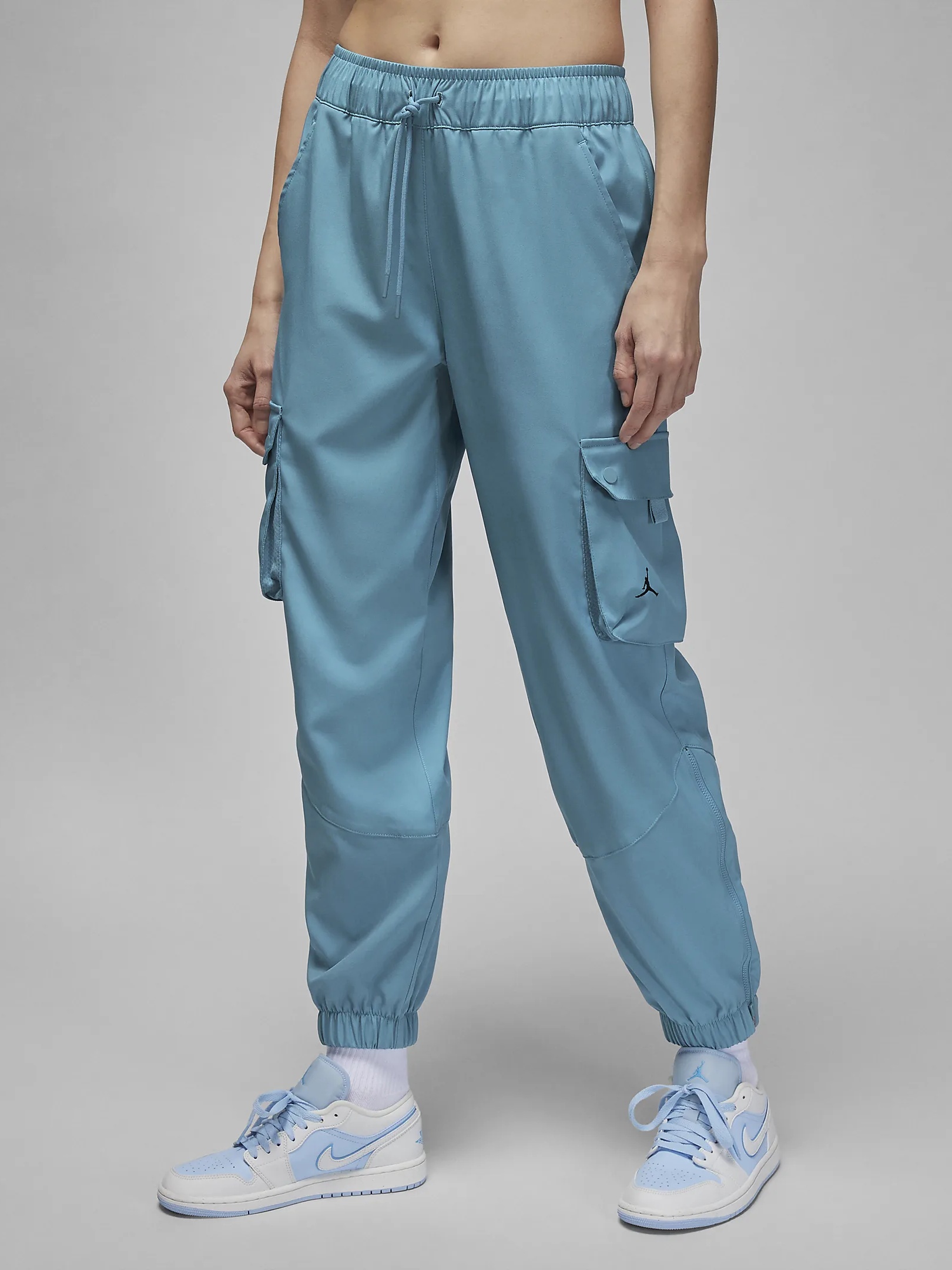 Акція на Спортивные штаны женские Nike AIR Jordan Tunnel Pant DQ4451-424 XS Лазурный/Зеленый/Черный від Rozetka