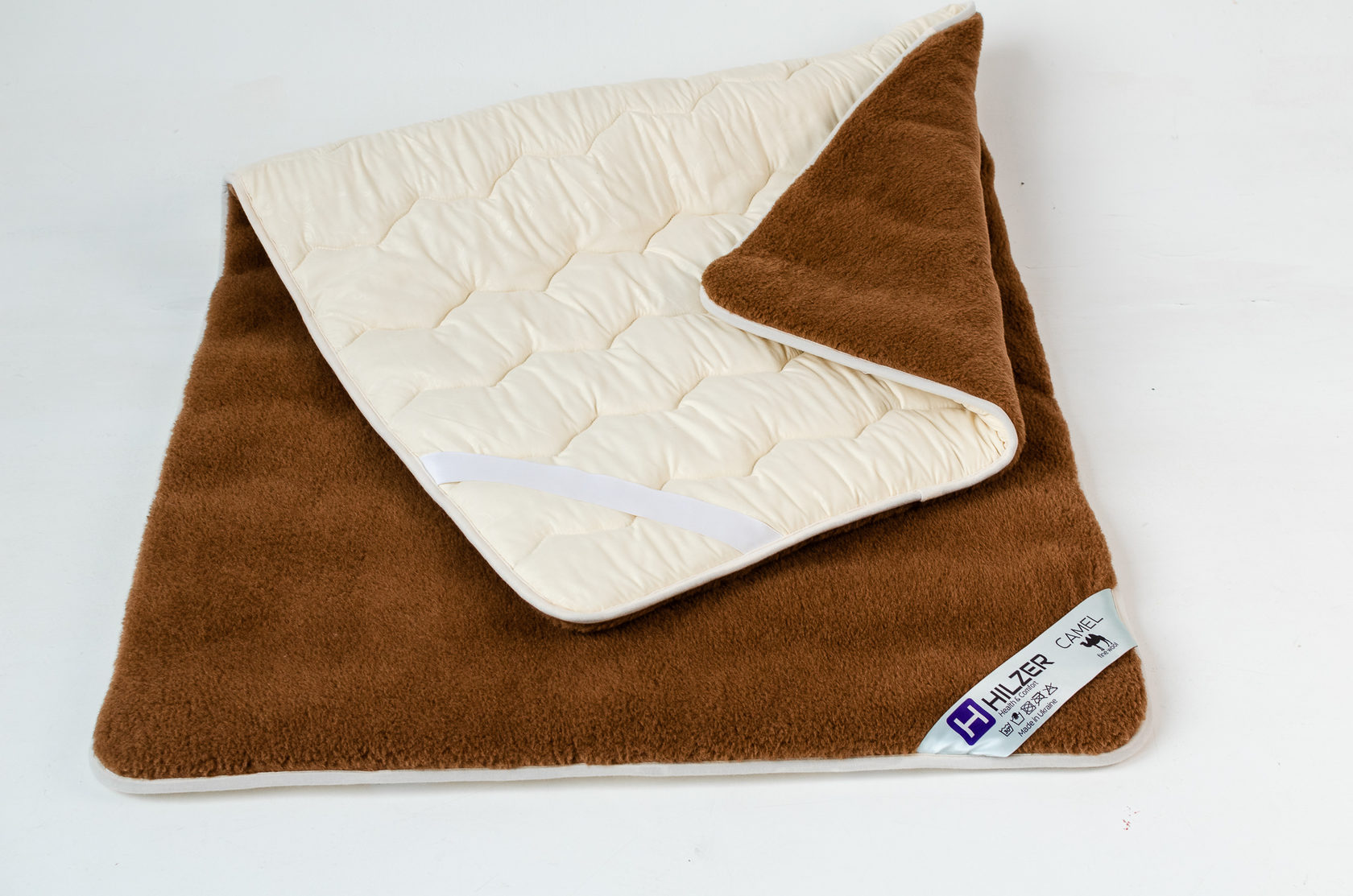 

Наматрасник из верблюжей шерсти 140x200 CAMEL Hilzer цвет Коричневый
