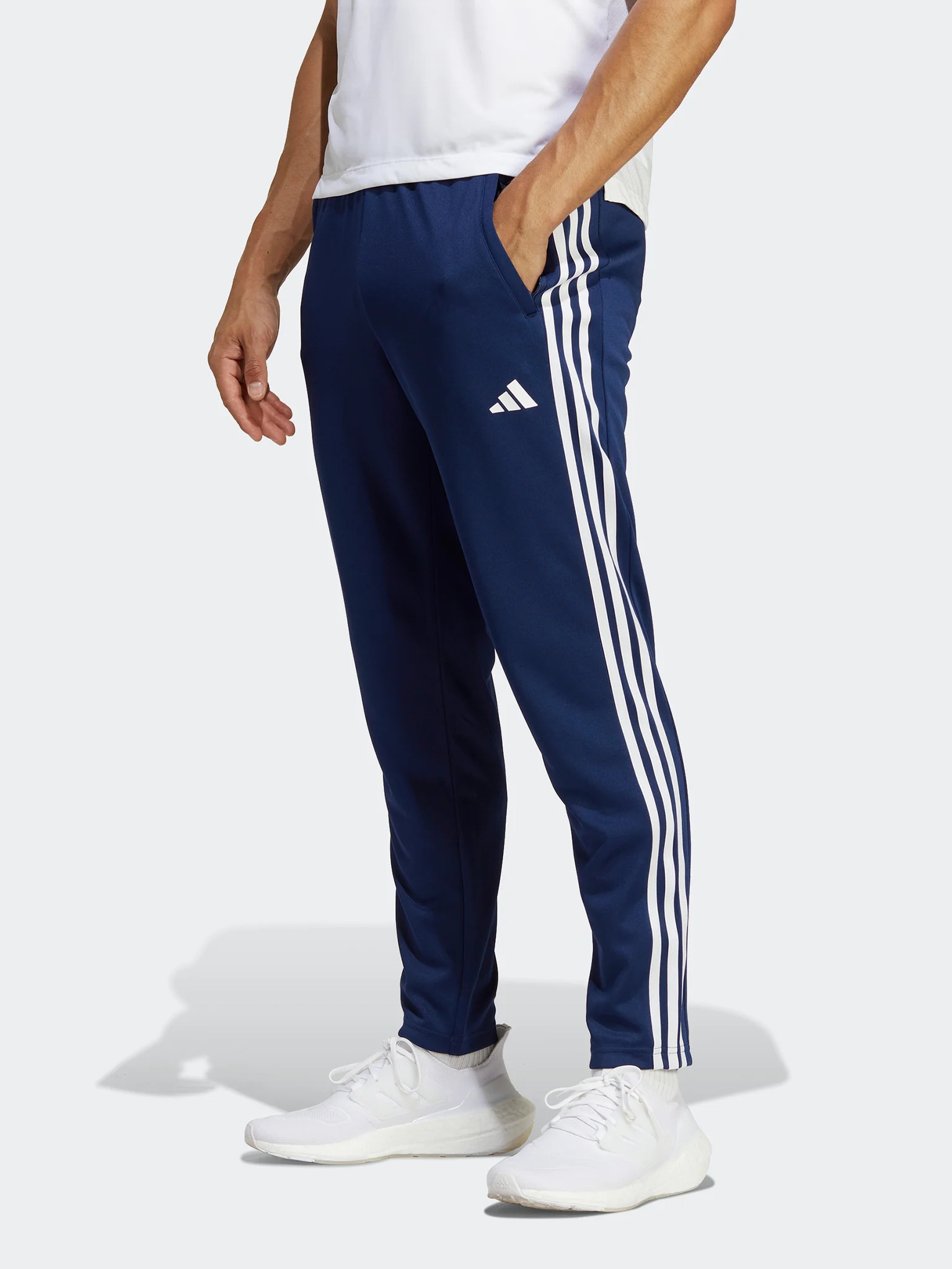 Акція на Спортивні штани чоловічі Adidas TR-ES BASE 3PT IB8169 L Dkblue/White від Rozetka