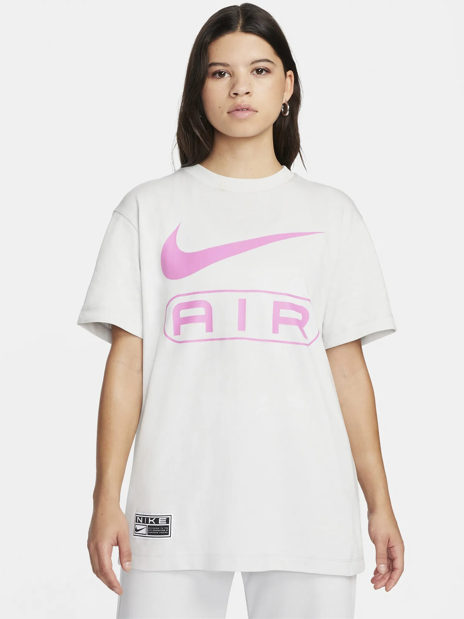 Акція на Футболка бавовняна оверсайз довга жіноча Nike Tee Air FV8002-025 M Фотонний пил/Грайливий рожевий від Rozetka