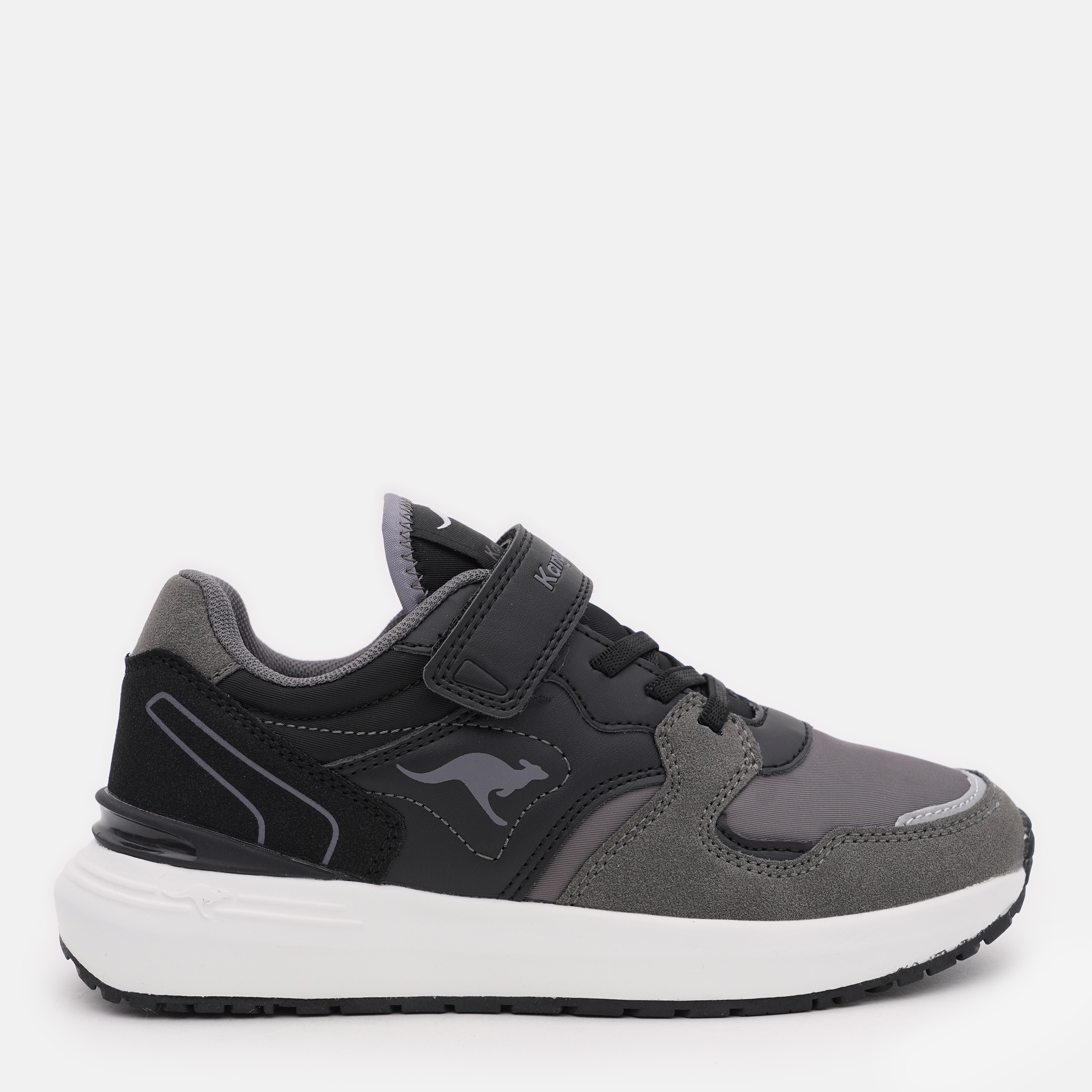 Акція на Підліткові кросівки для хлопчика Kangaroos 10016-5003 39 Jet Black/Steel Grey від Rozetka