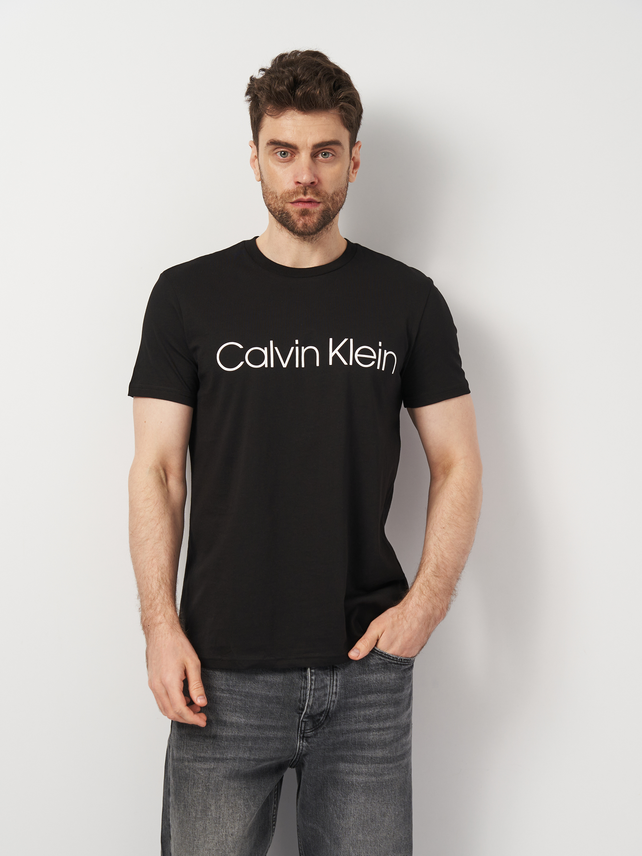 Акція на Футболка чоловіча Calvin Klein Jeans 11322.1 S (44) Чорна від Rozetka