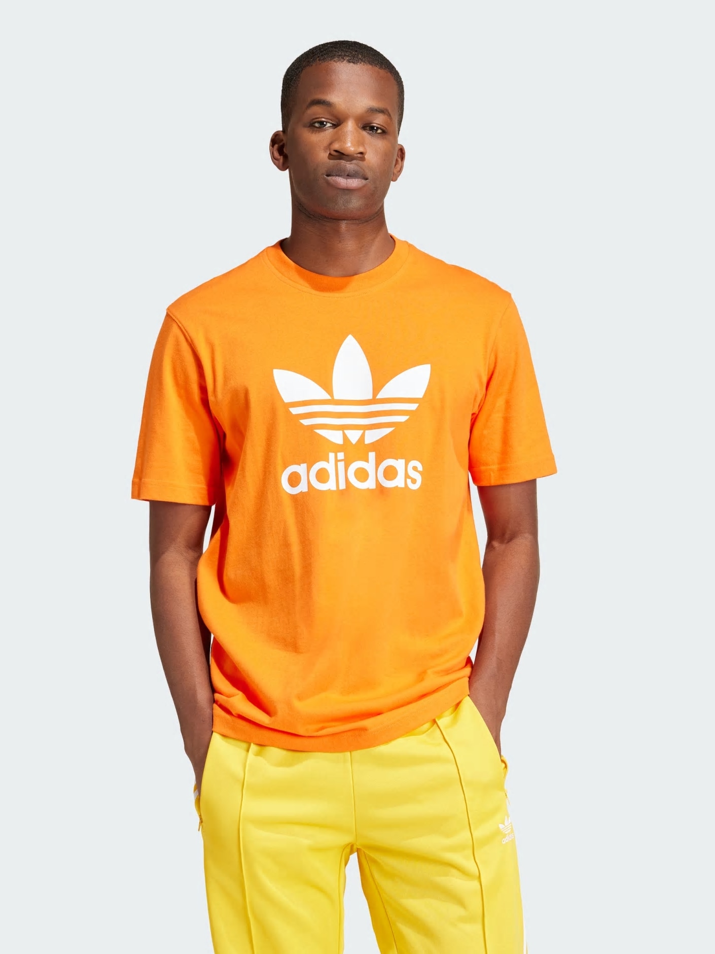 Акція на Футболка бавовняна довга чоловіча Adidas Trefoil T-Shirt IR8000 S Помаранчева від Rozetka