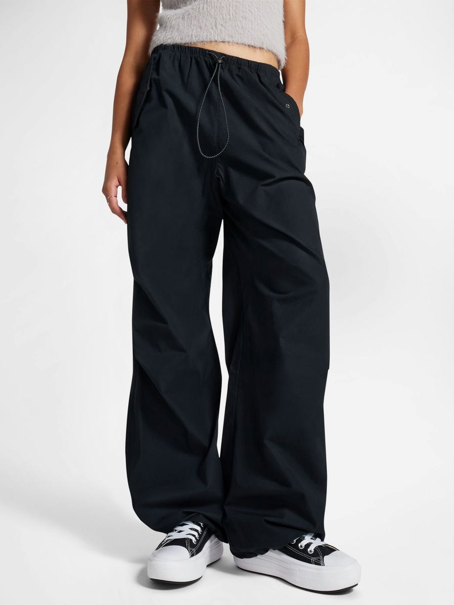 Акція на Спортивні штани жіночі Converse Woven Pants 10026399-001 S Чорні від Rozetka