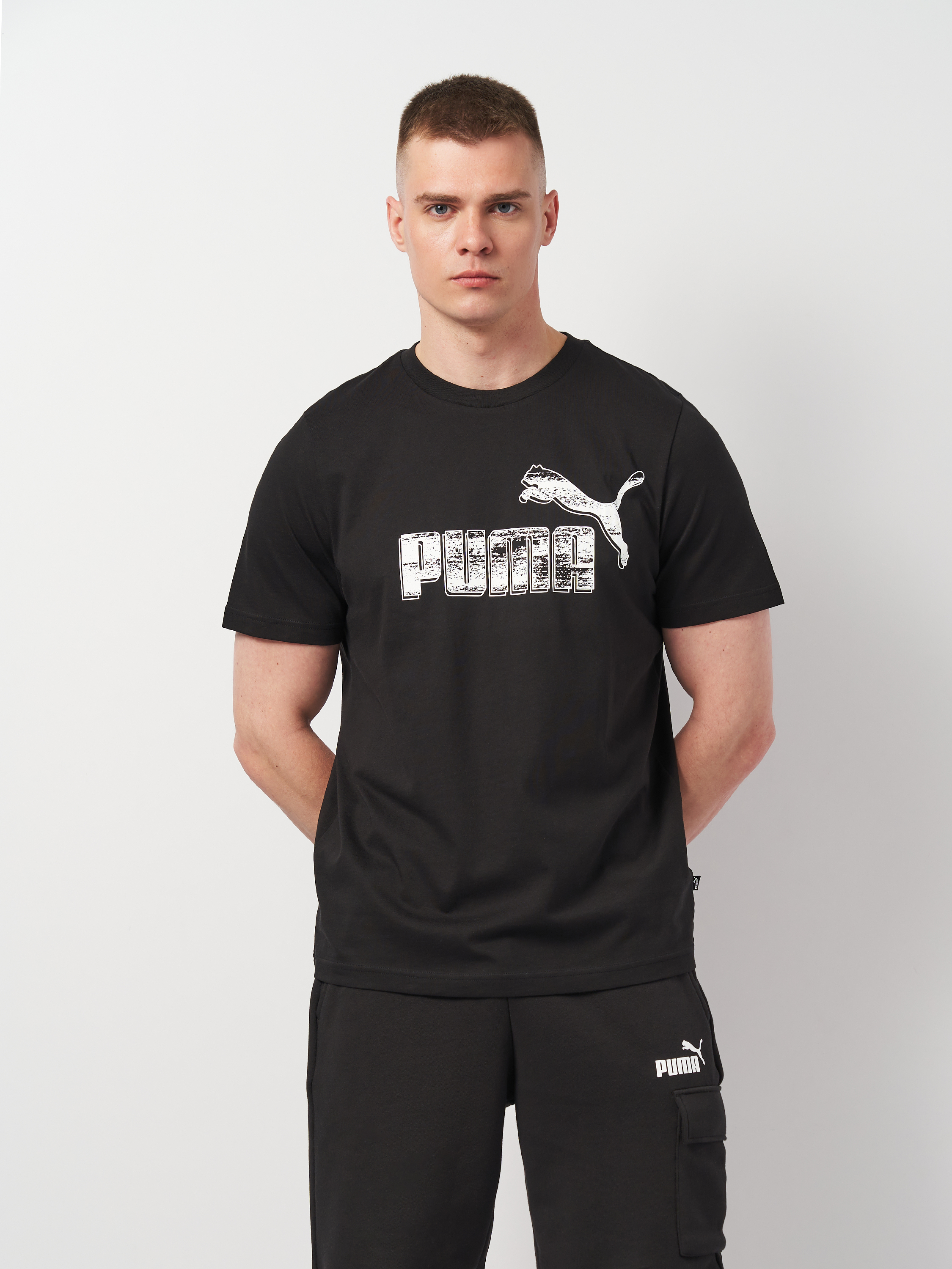 Акція на Футболка чоловіча Puma Graphics 68016501 XS Чорна з принтом від Rozetka