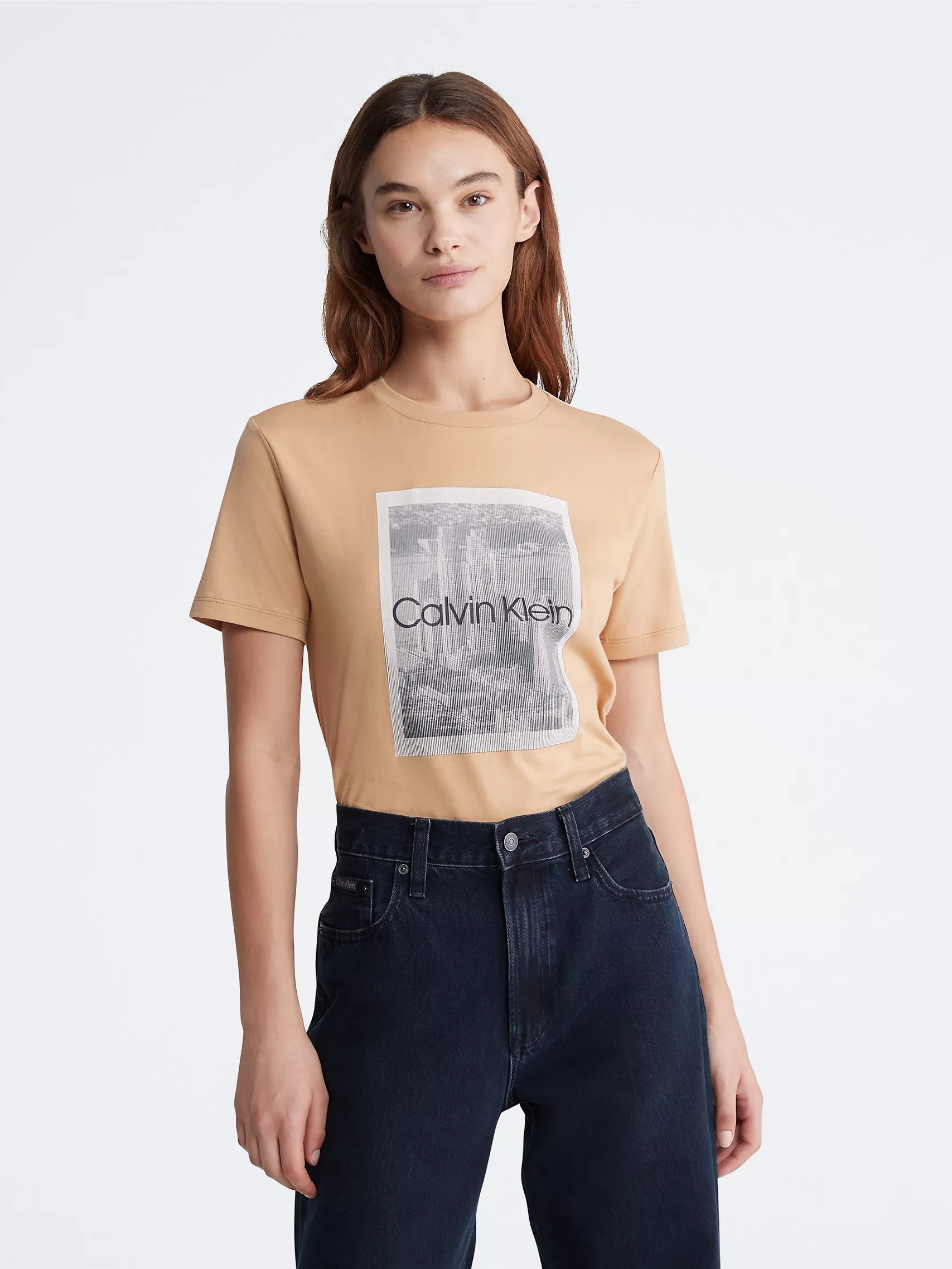 Акція на Футболка бавовняна жіноча Calvin Klein 2701440 S Бежева від Rozetka