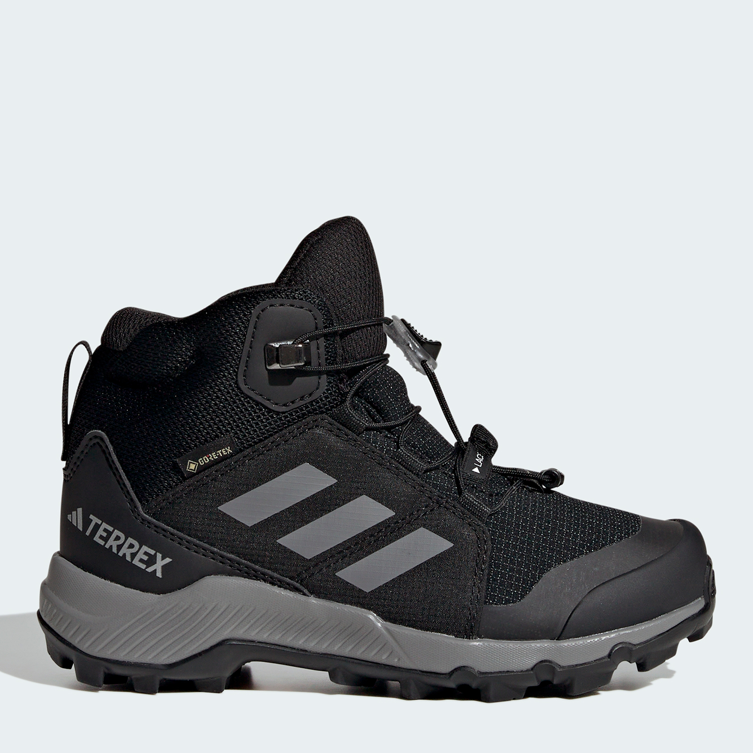 Акція на Дитячі демісезонні черевики для хлопчика Adidas Terrex Mid Gtx K IF7522 33 Чорні від Rozetka