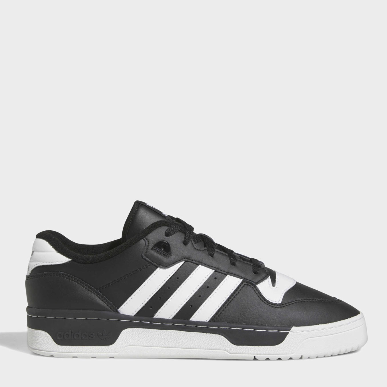 Акція на Чоловічі кеди низькі Adidas Rivalry Low FZ6327 40.5 (7UK) 25.5 см Cblack/Ftwwht/Cblack від Rozetka