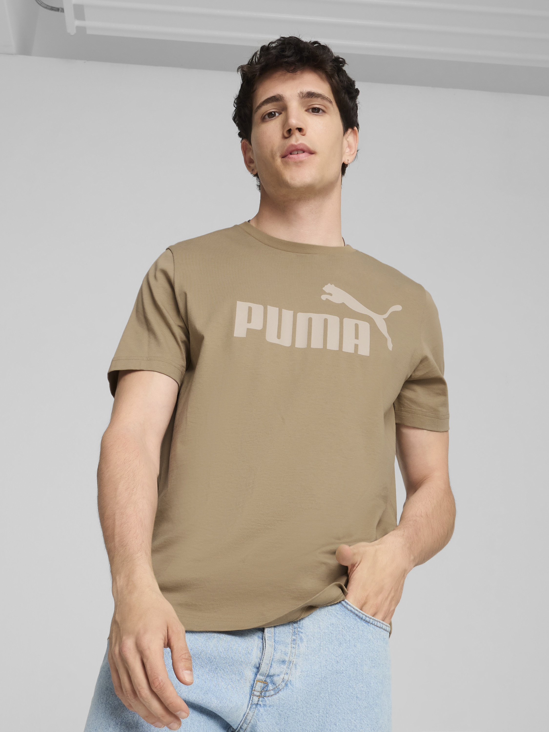 Акція на Футболка бавовняна чоловіча Puma Ess Logo Tee 58666713 M Коричнева від Rozetka