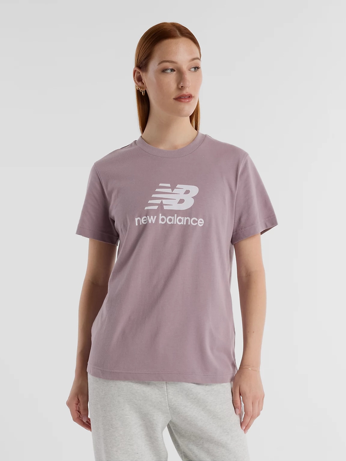 Акція на Футболка бавовняна жіноча New Balance Essentials Jersey Logo WT41502ICW XS Світло-бузкова від Rozetka