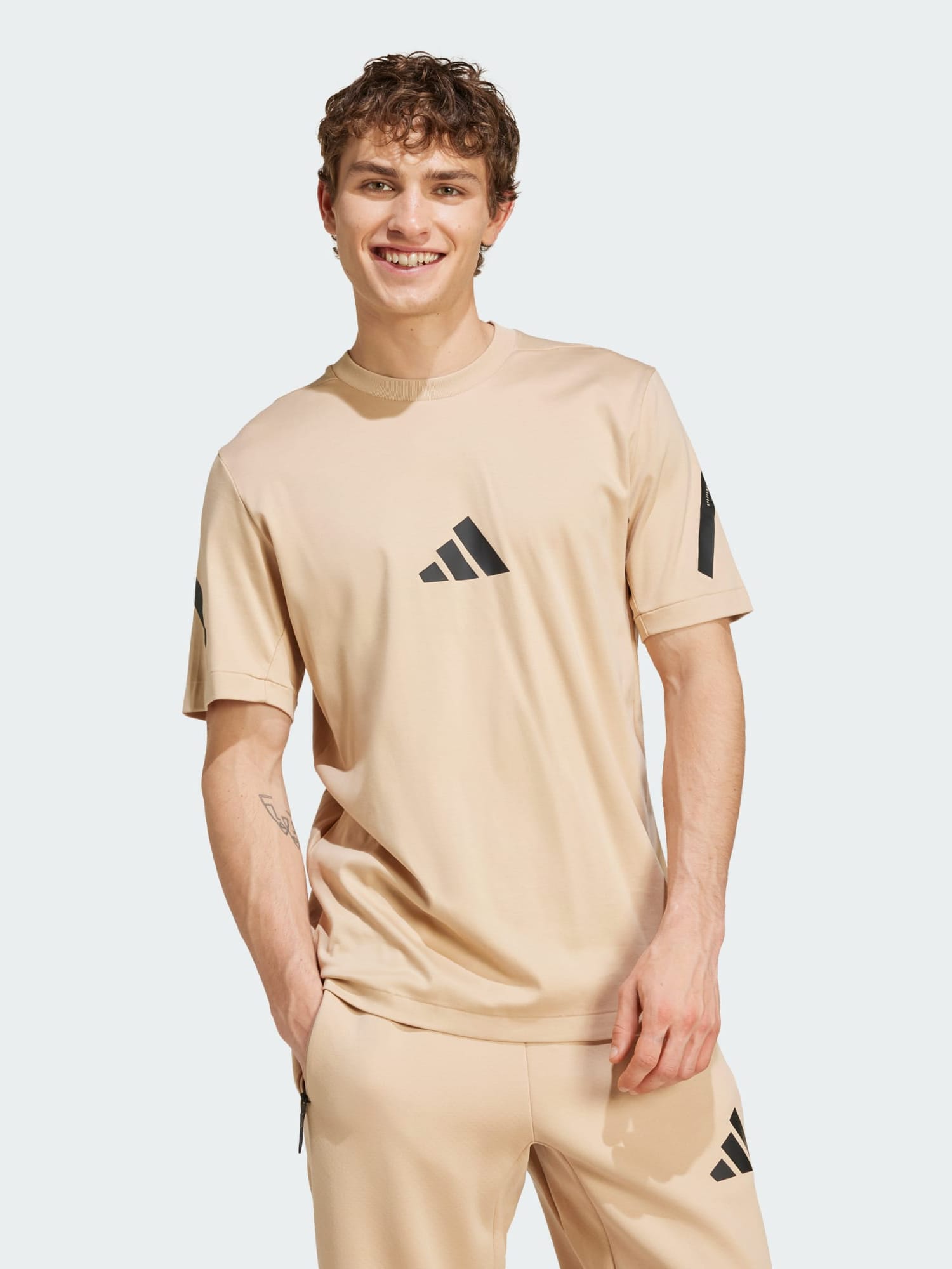 Акція на Футболка бавовняна довга чоловіча Adidas M Z.N.E. Tee JF2453 M Бежева від Rozetka