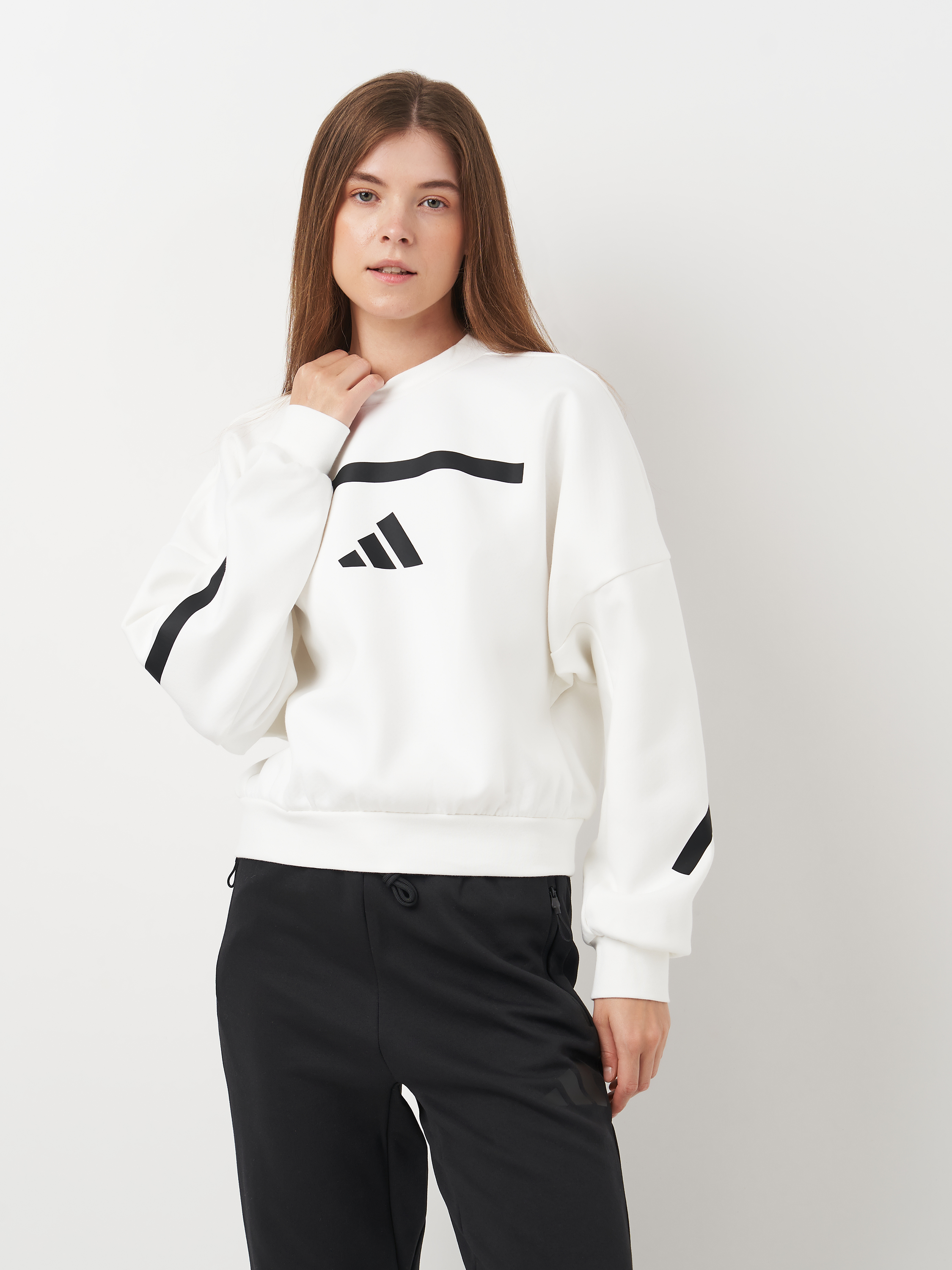 Акція на Світшот жіночий Adidas W Z.N.E. Swt JI7554 XL Білий від Rozetka