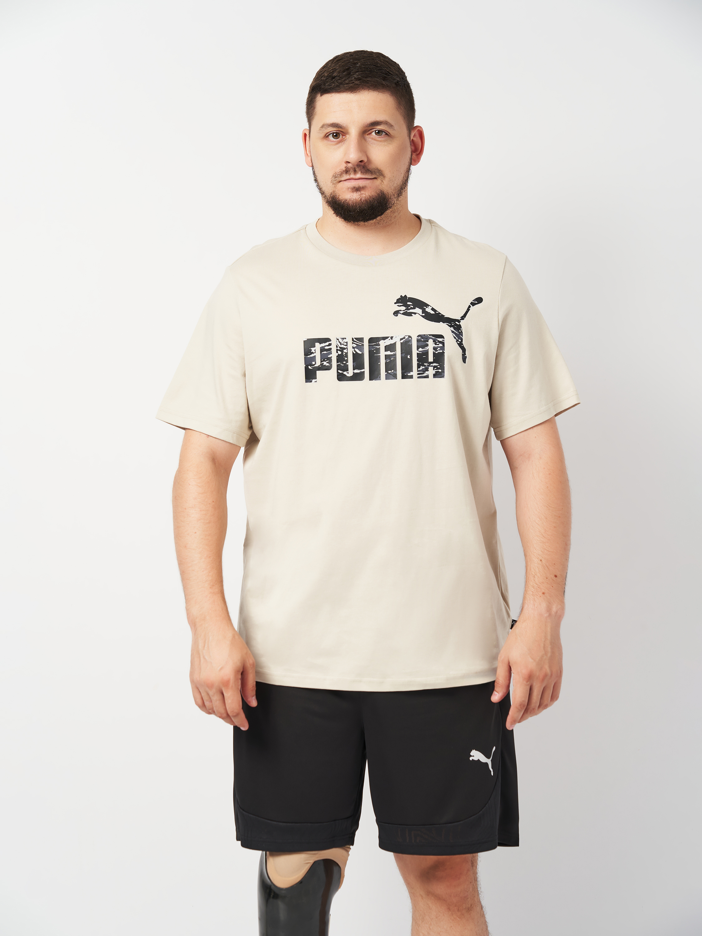 Акція на Футболка бавовняна чоловіча Puma Ess+ Camo Graphic Tee 68323668 XL Бежева від Rozetka